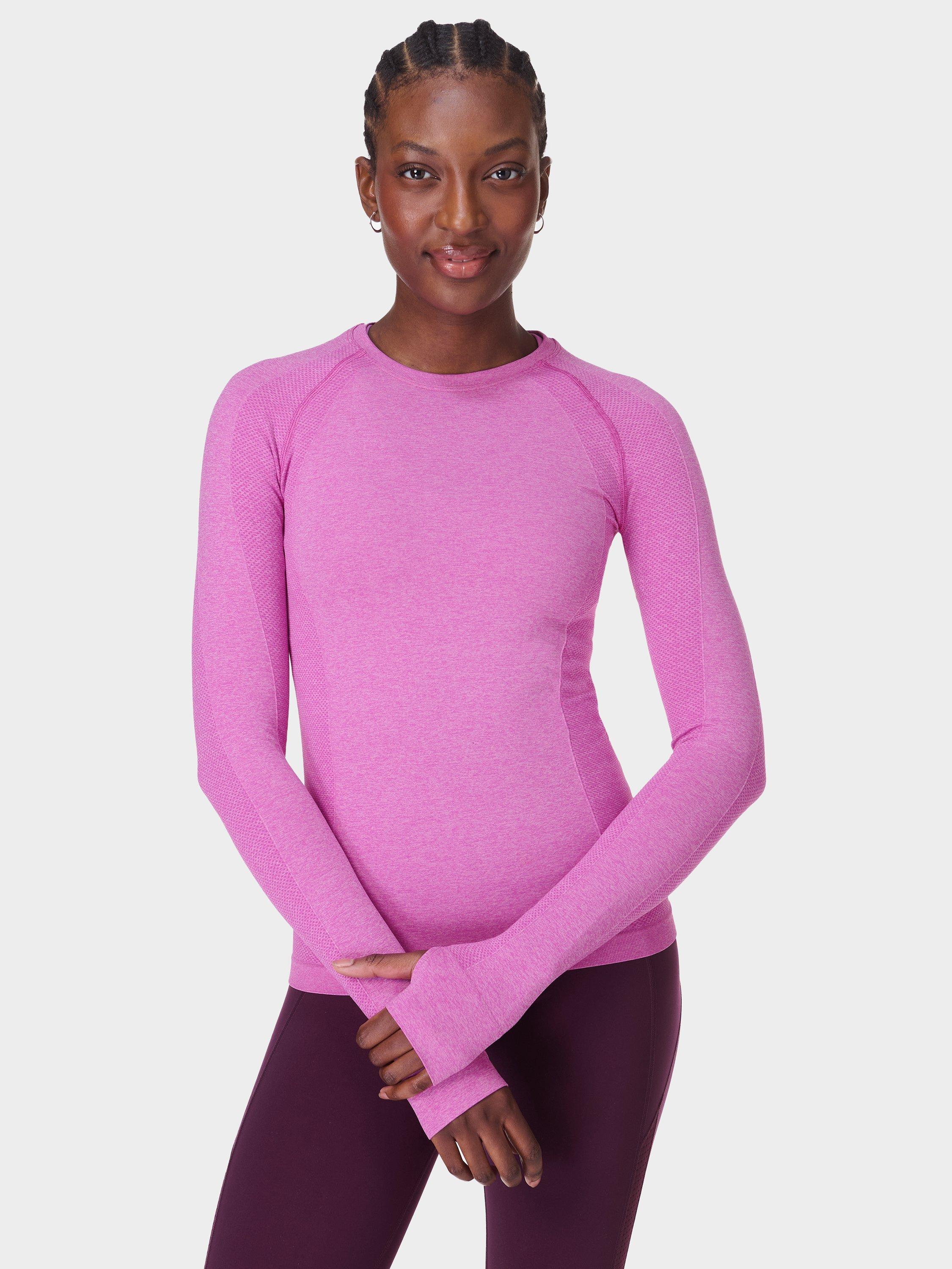 Product image 1 of 7, which shows Sweaty Betty Athlete Seamless Long Sleeve Gym Top, Allium Pink/Nerine Pink Marl, XXS
