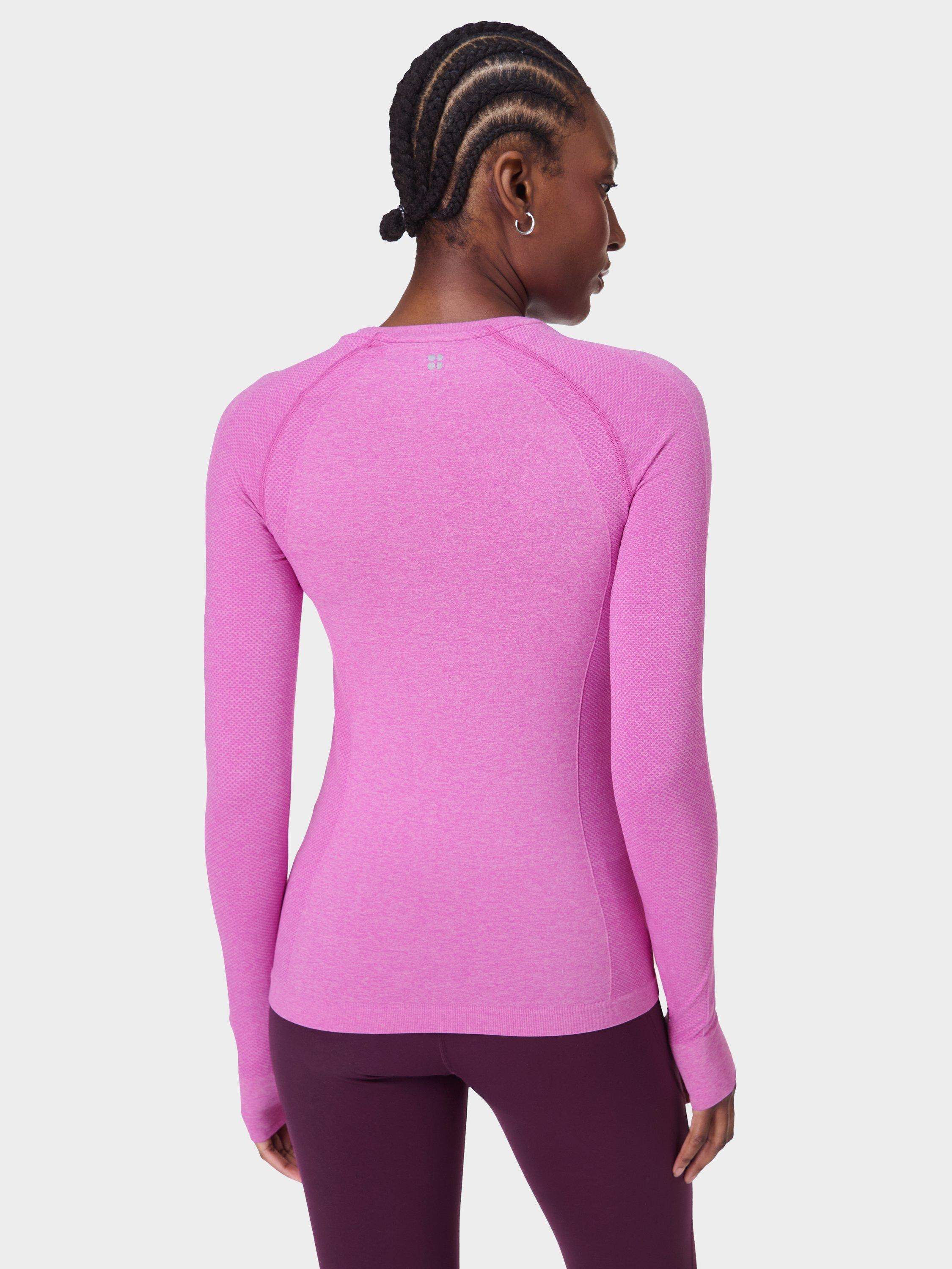 Product image 4 of 7, which shows Sweaty Betty Athlete Seamless Long Sleeve Gym Top, Allium Pink/Nerine Pink Marl, XXS