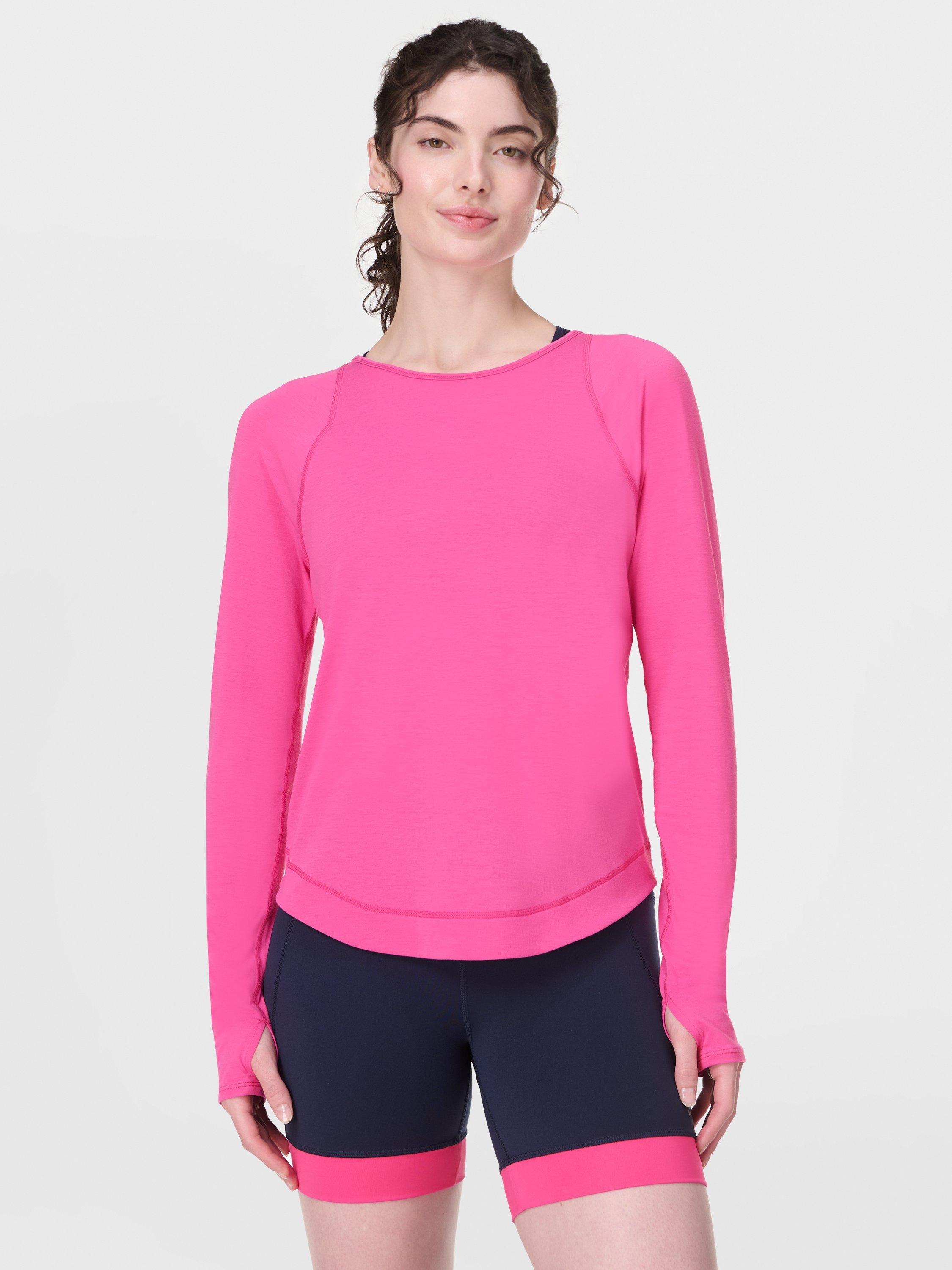 Product image 1 of 7, which shows Sweaty Betty Breathe Easy Long Sleeve Top, Fuchsia Pink, XXS