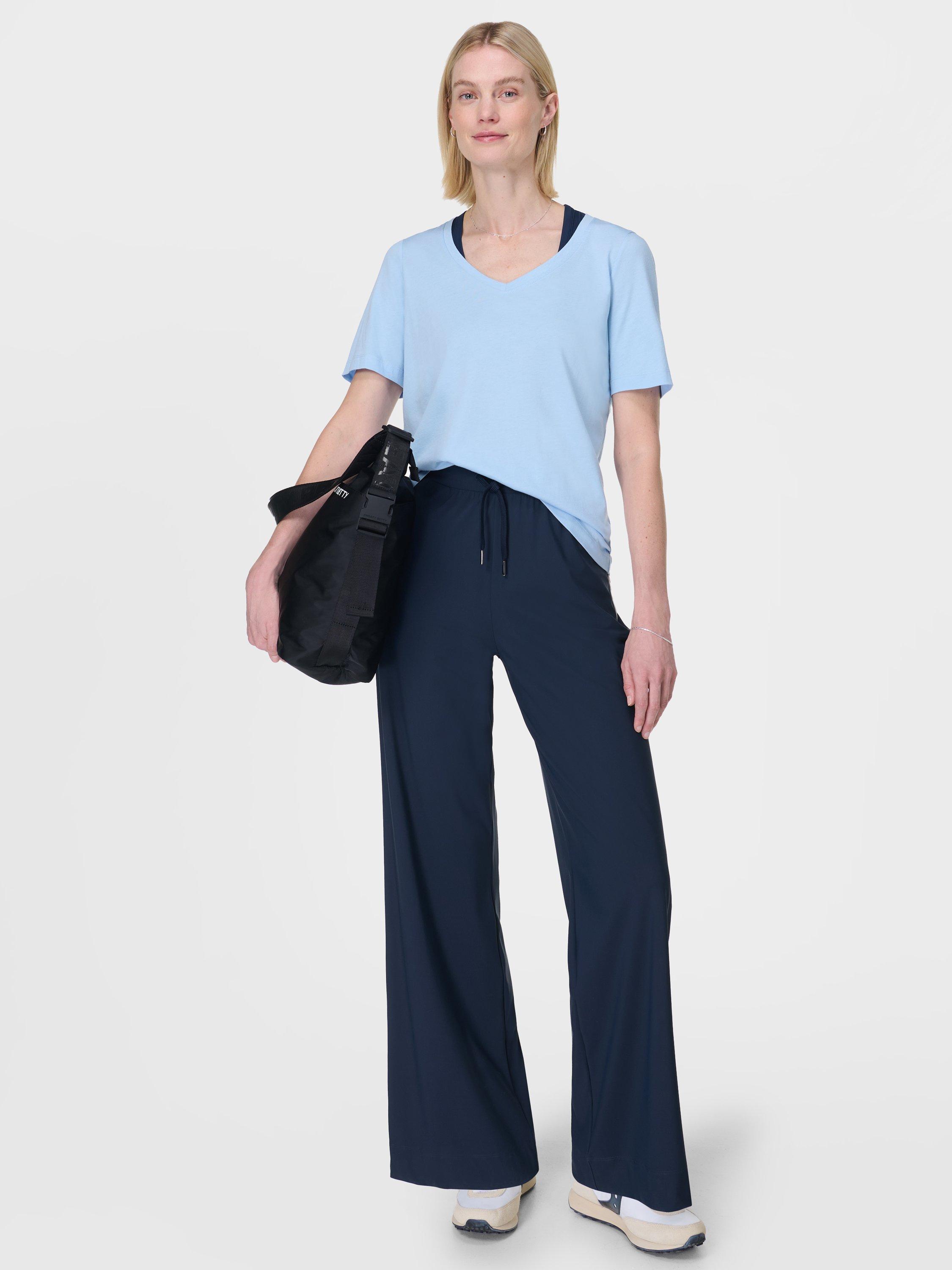 Product image 3 of 8, which shows Sweaty Betty Essential V-Neck T-Shirt, Breeze Blue, XXS