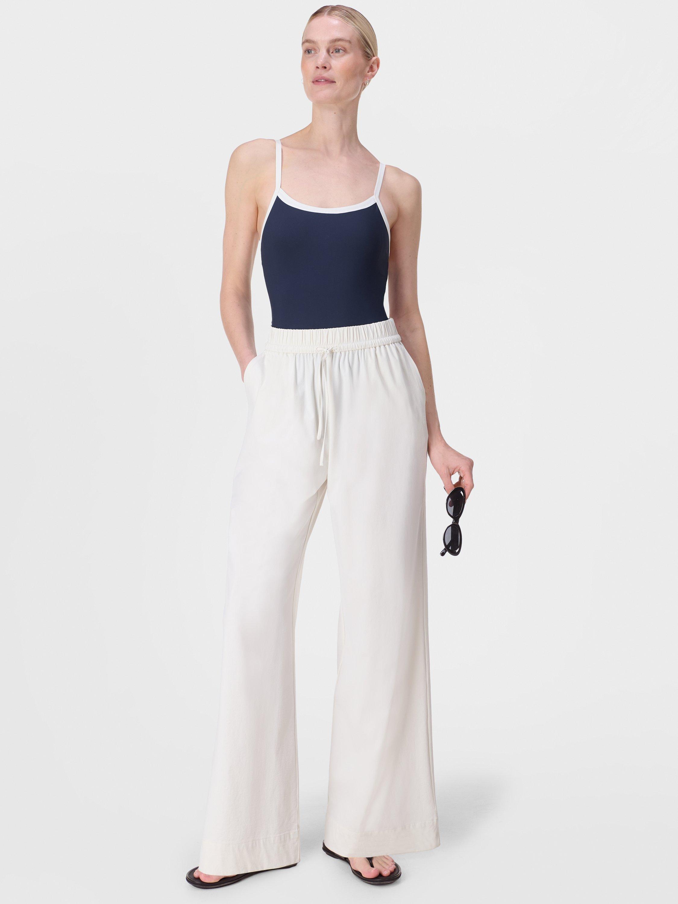 Product image 4 of 7, which shows Sweaty Betty Xtra Life Riviera Swimsuit, Navyblue Lilywhite, XXS