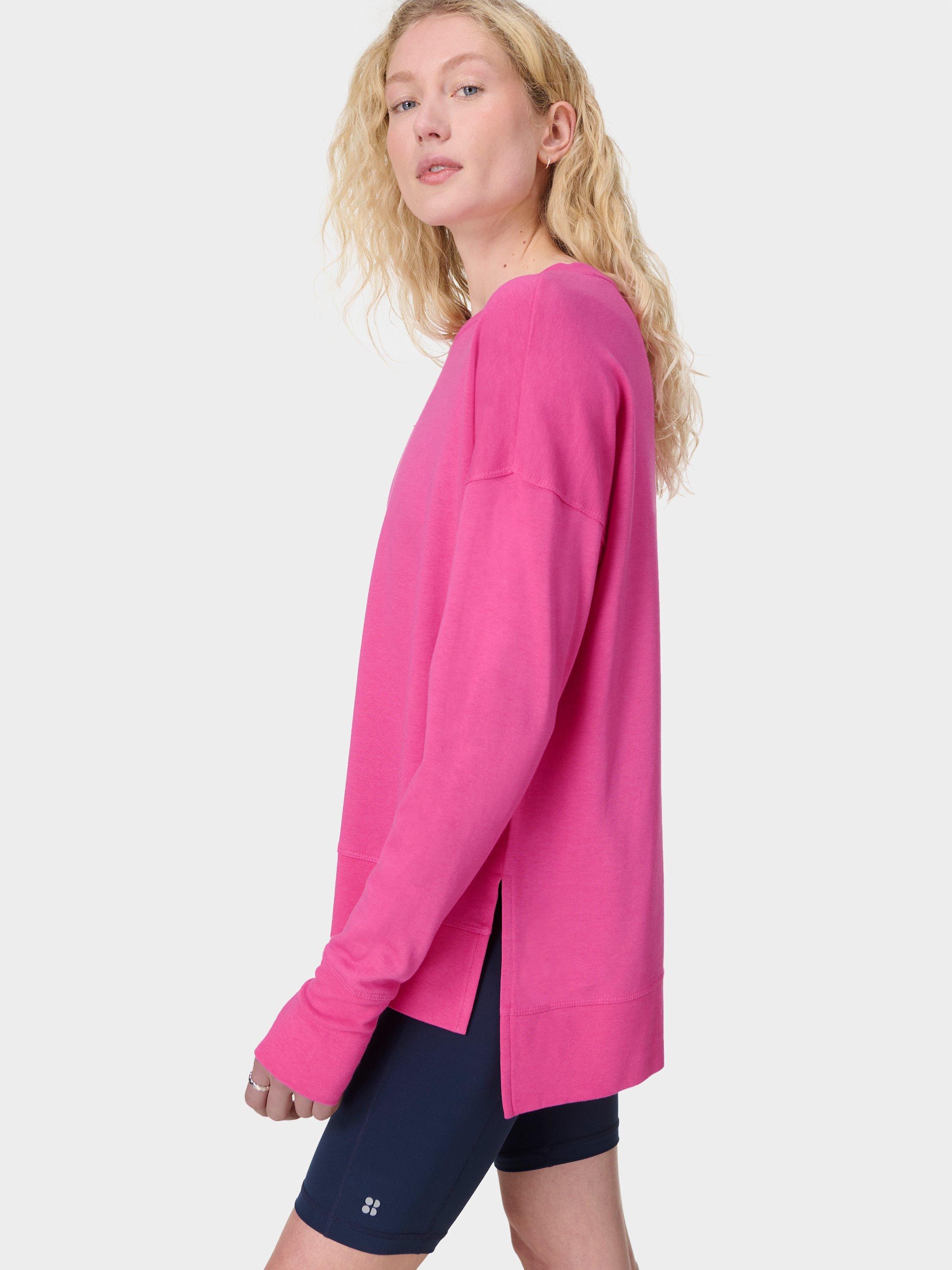 Product image 2 of 7, which shows Sweaty Betty After Class Longline Sweatshirt, Fuchsia Pink, XS