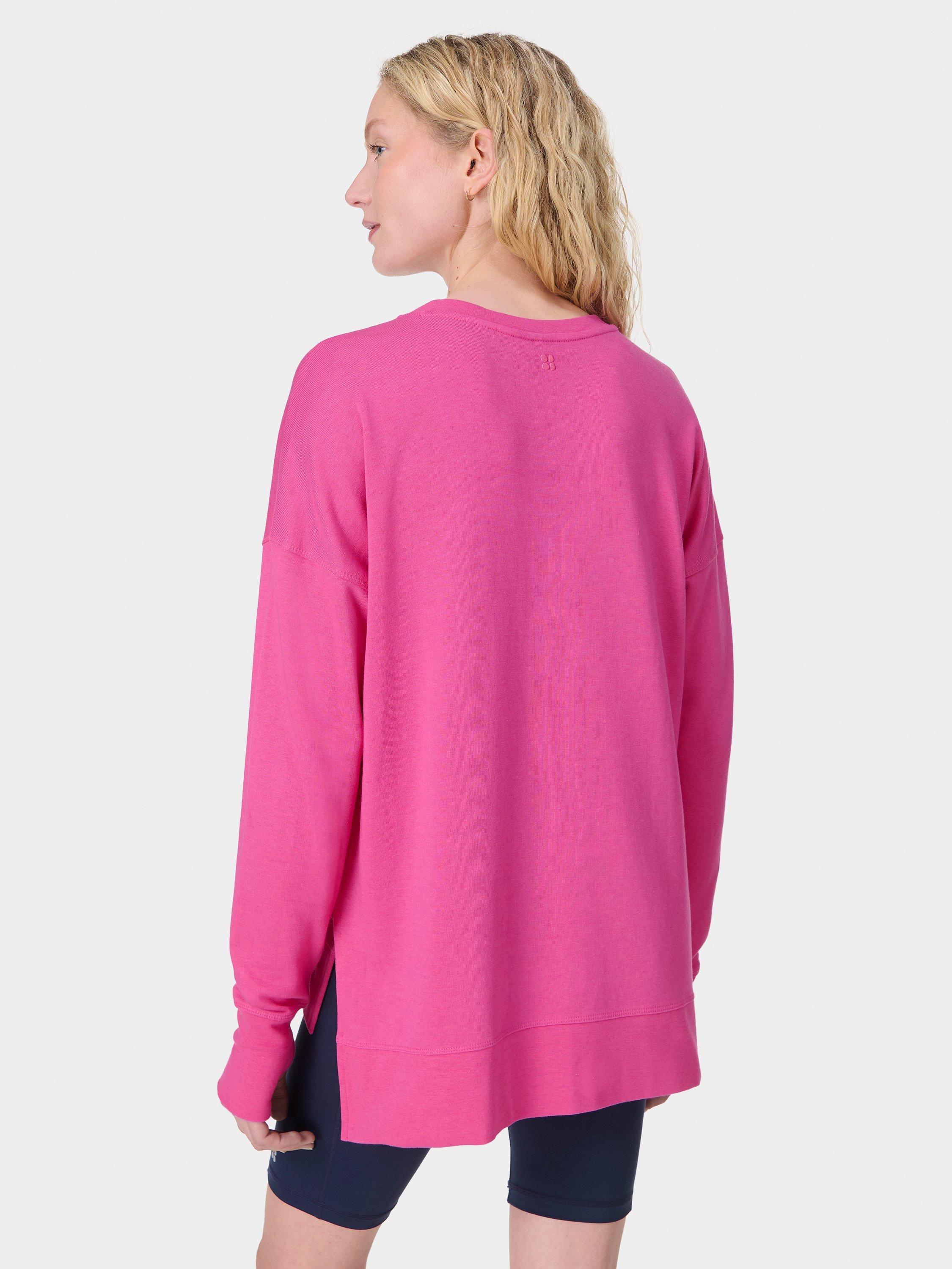 Product image 4 of 7, which shows Sweaty Betty After Class Longline Sweatshirt, Fuchsia Pink, XS