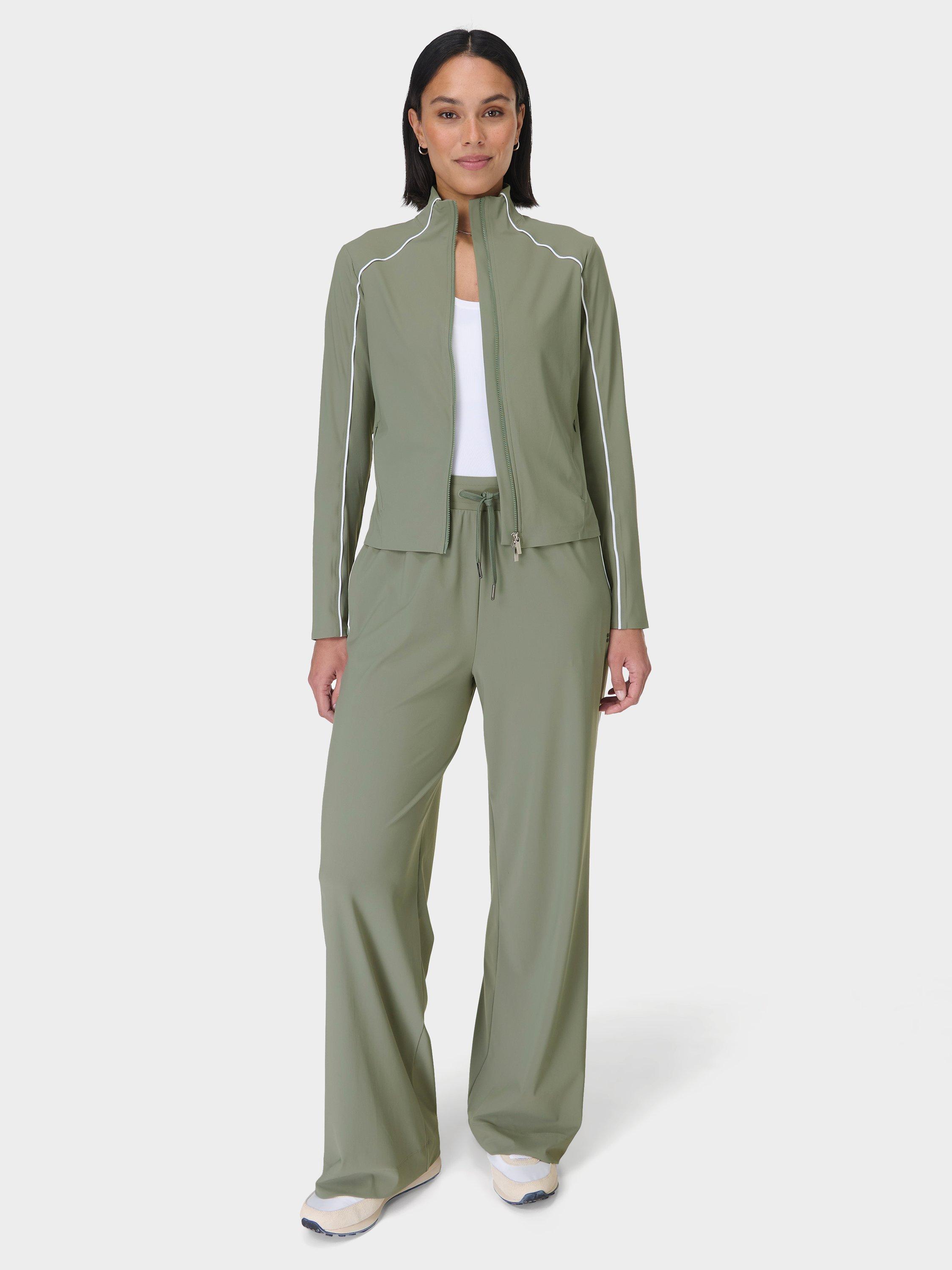 Product image 4 of 8, which shows Sweaty Betty Anytime Explorer Zip Up, Willow Green, XXS