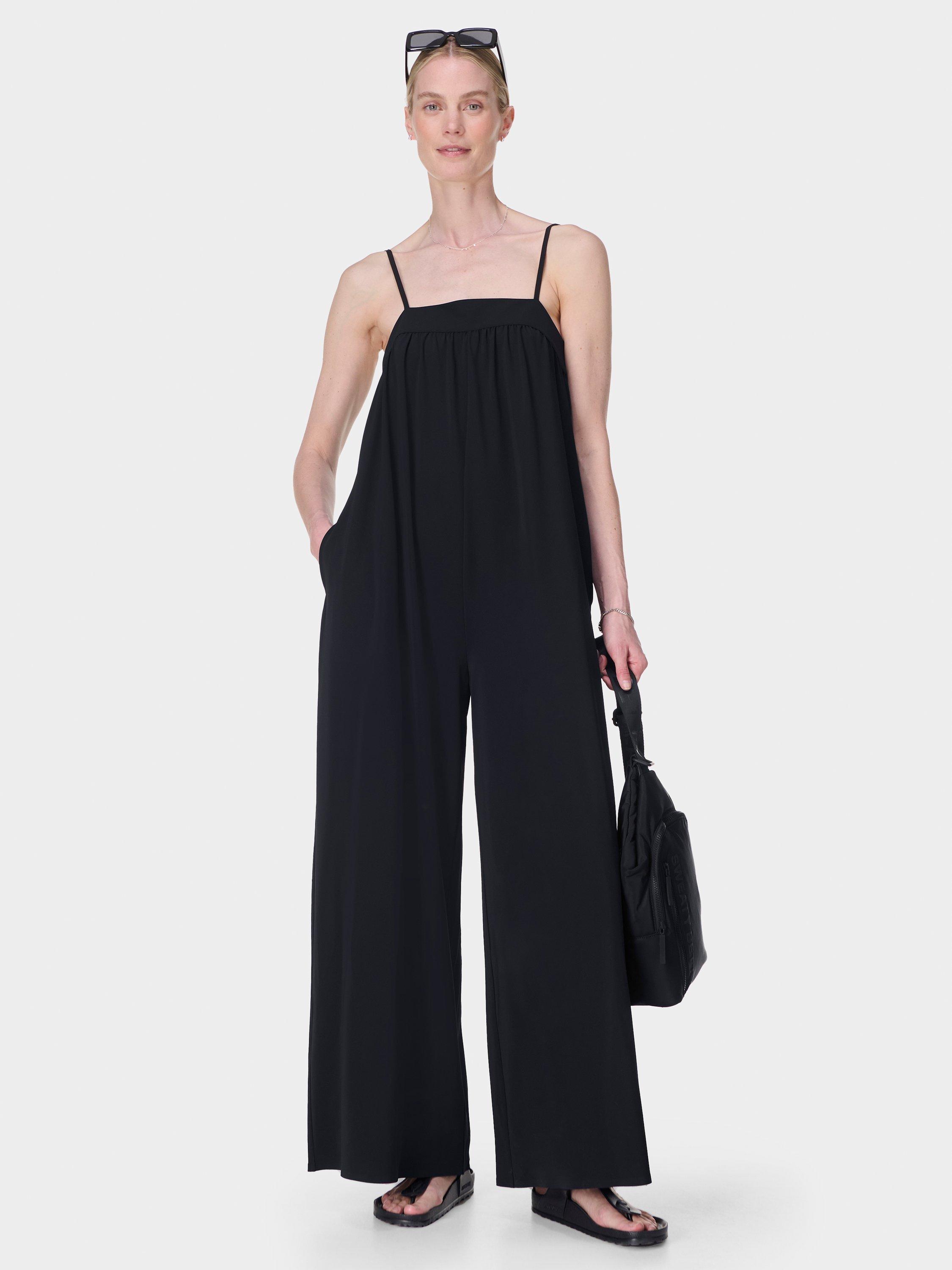 Product image 1 of 7, which shows Sweaty Betty Explorer Summer 30" Jumpsuit, Black, XXS