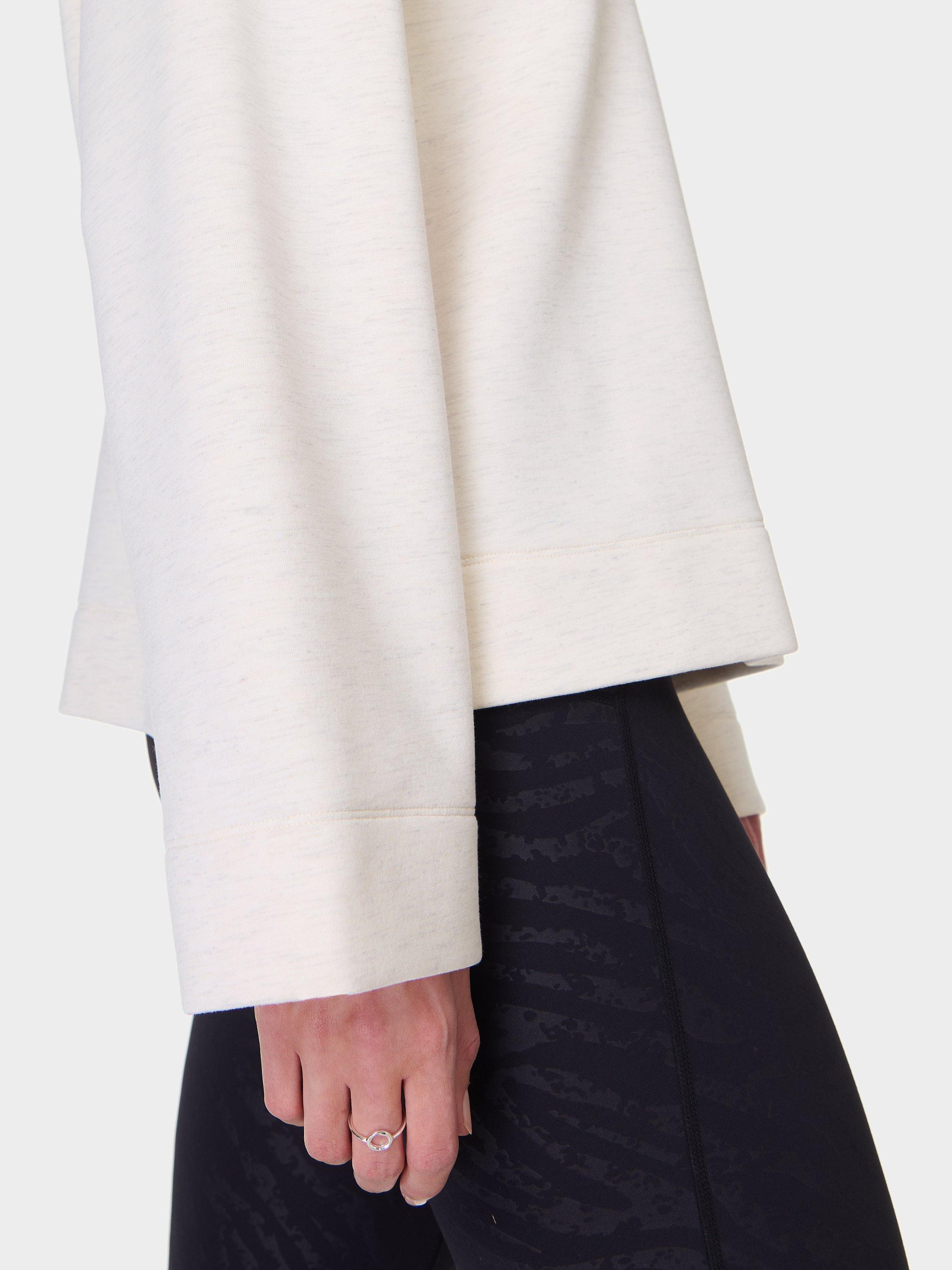 Product image 6 of 8, which shows Sweaty Betty Wind Down Funnel Neck Jumper, White Marl, L
