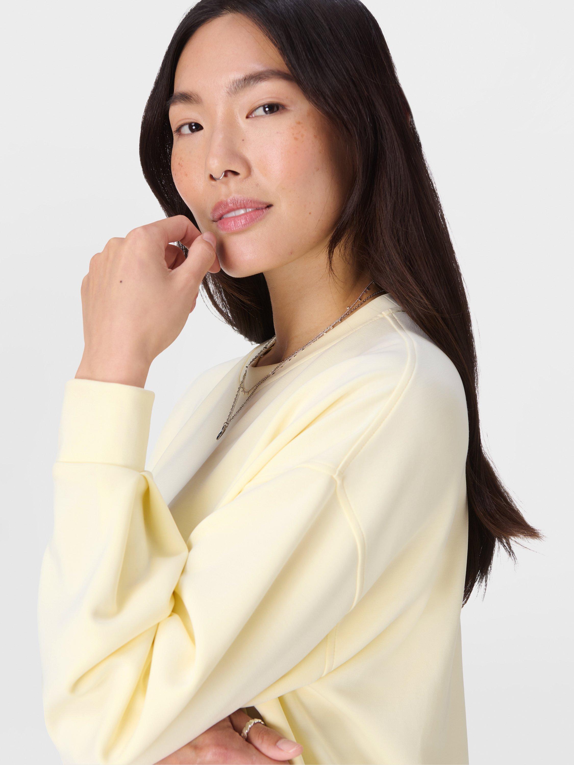 Product image 2 of 6, which shows Sweaty Betty Sand Wash Cloud Weight Sweatshirt, Buttercream Yellow, XXS