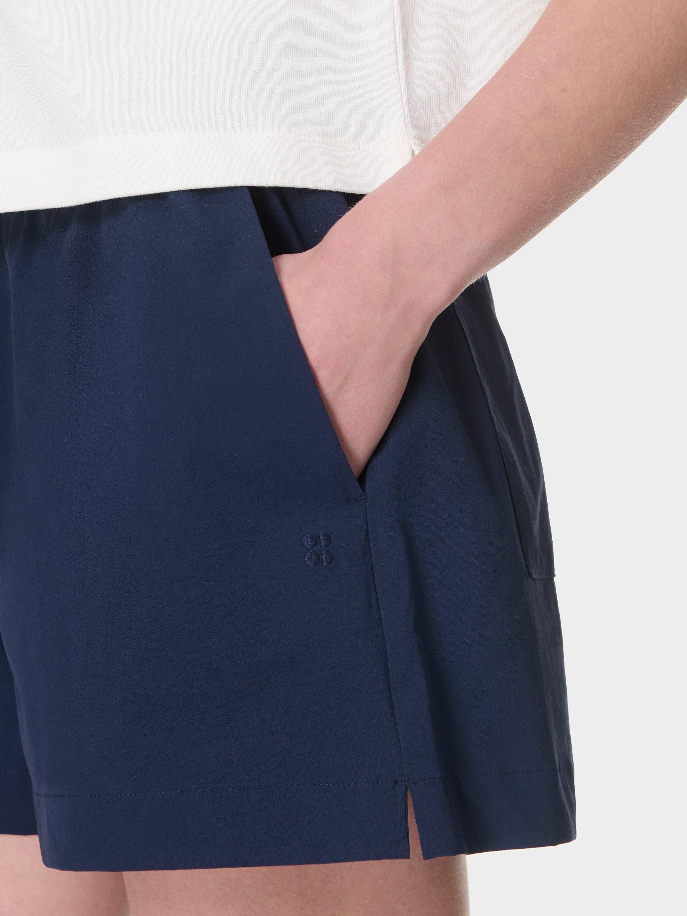 Product image 5 of 6, which shows Sweaty Betty Summer City Shorts, Navy Blue, XXS