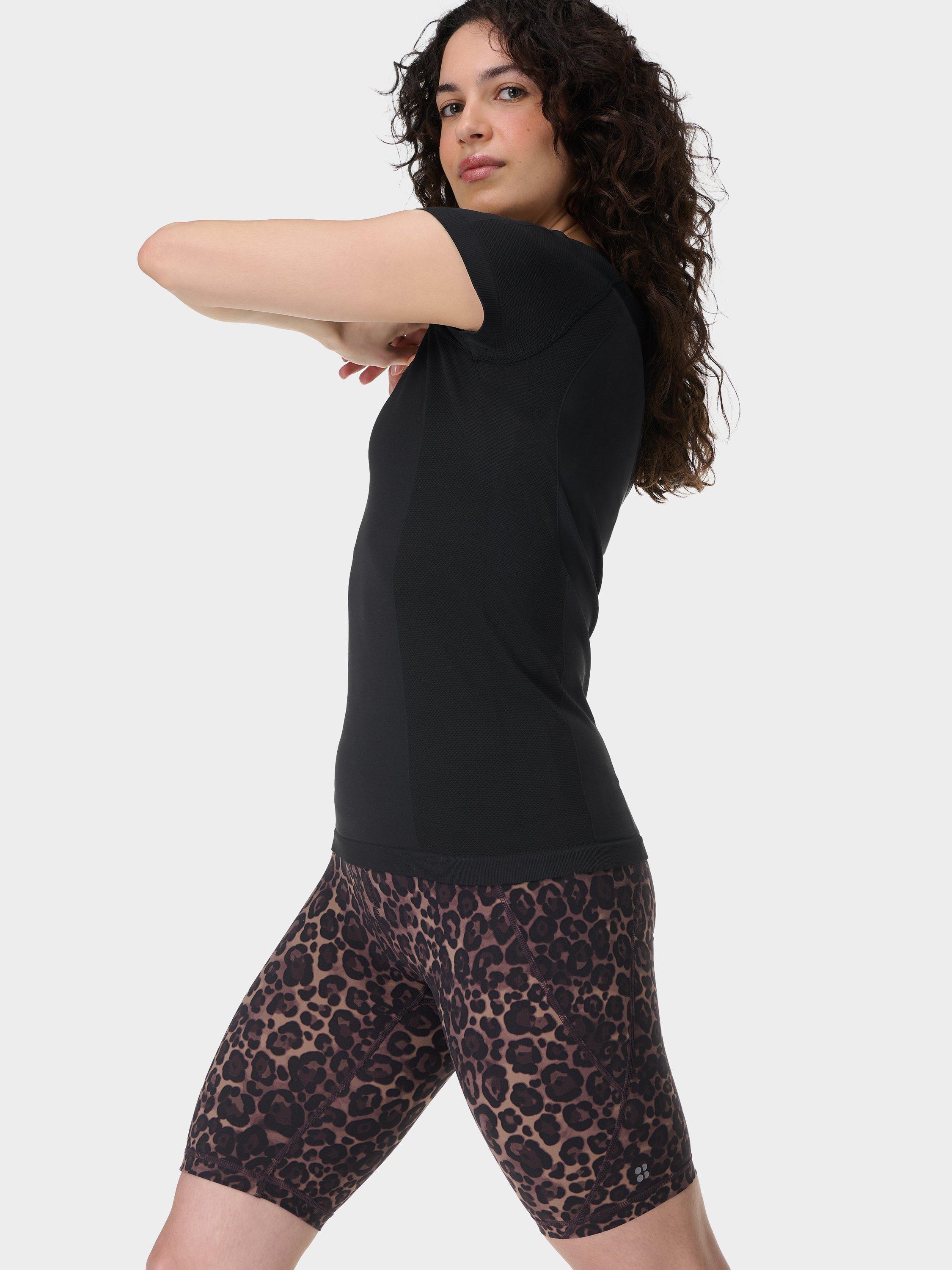 Product image 2 of 8, which shows Sweaty Betty Power 9" Biker Shorts, Brown Wild Leopard Print, XXS