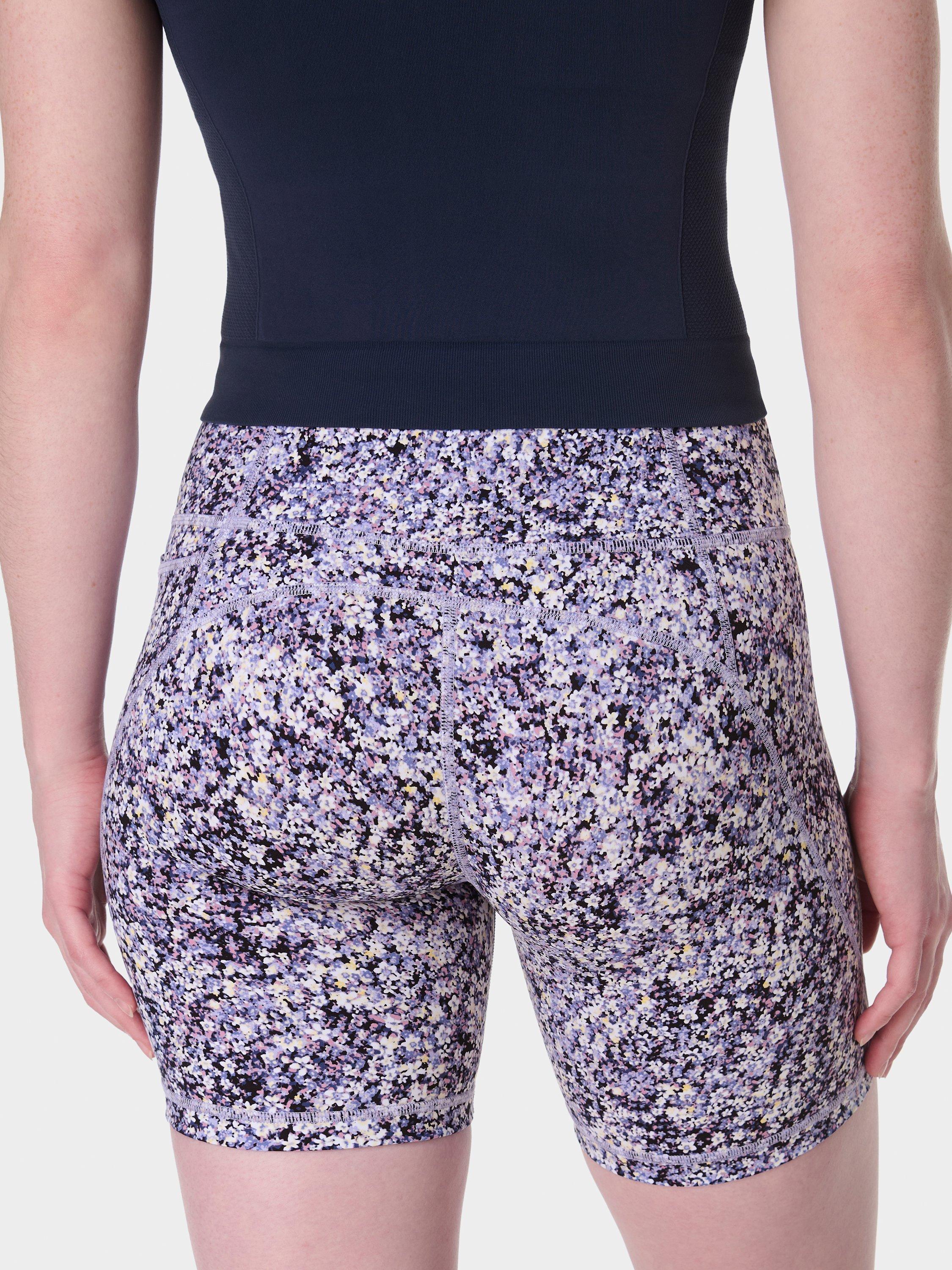 Product image 4 of 8, which shows Sweaty Betty Power 6" Biker Shorts, Purple Meadow Print, XXS
