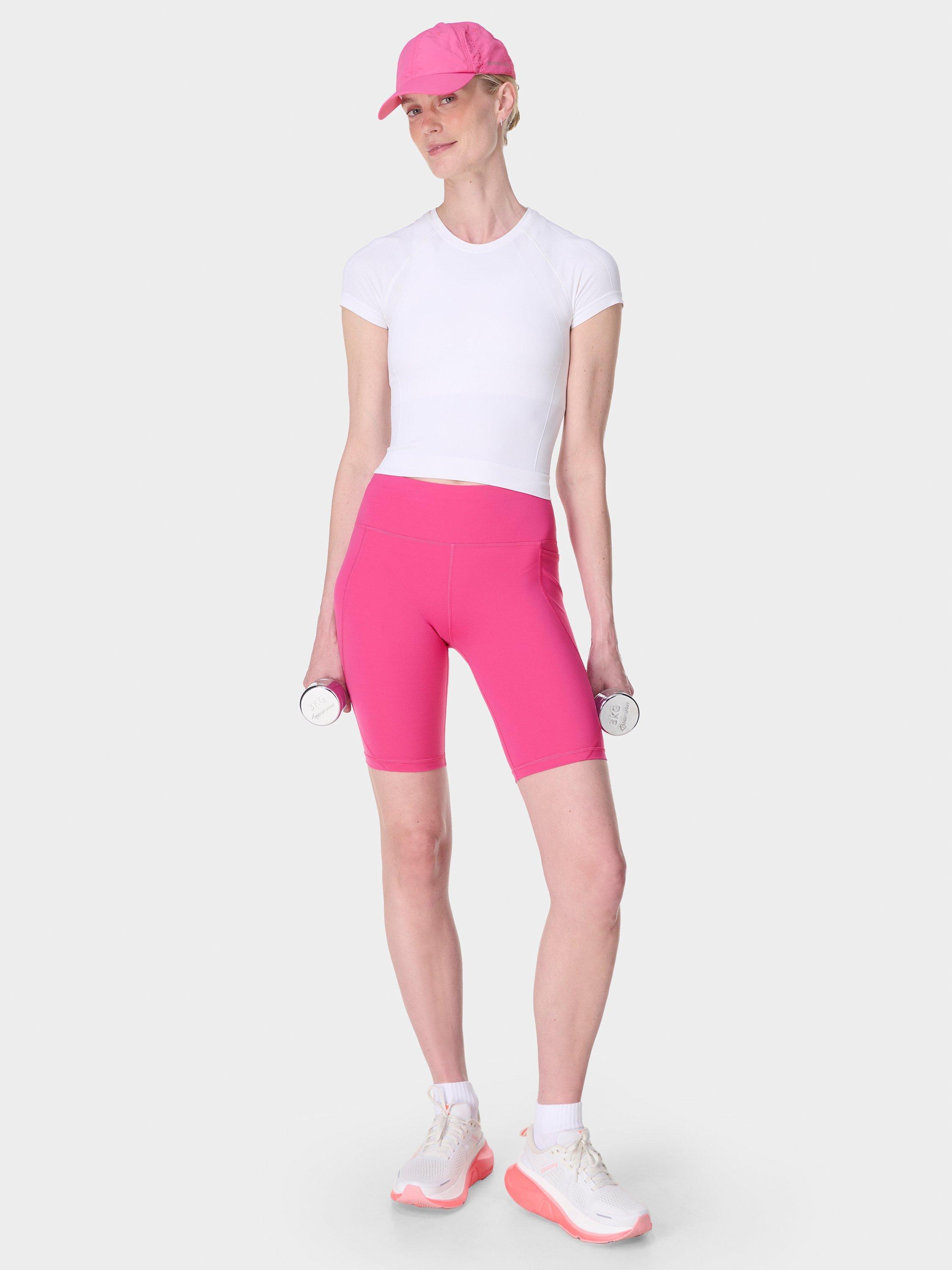 Product image 3 of 8, which shows Sweaty Betty Power 9" Biker Shorts, Fuchsia Pink, XXS