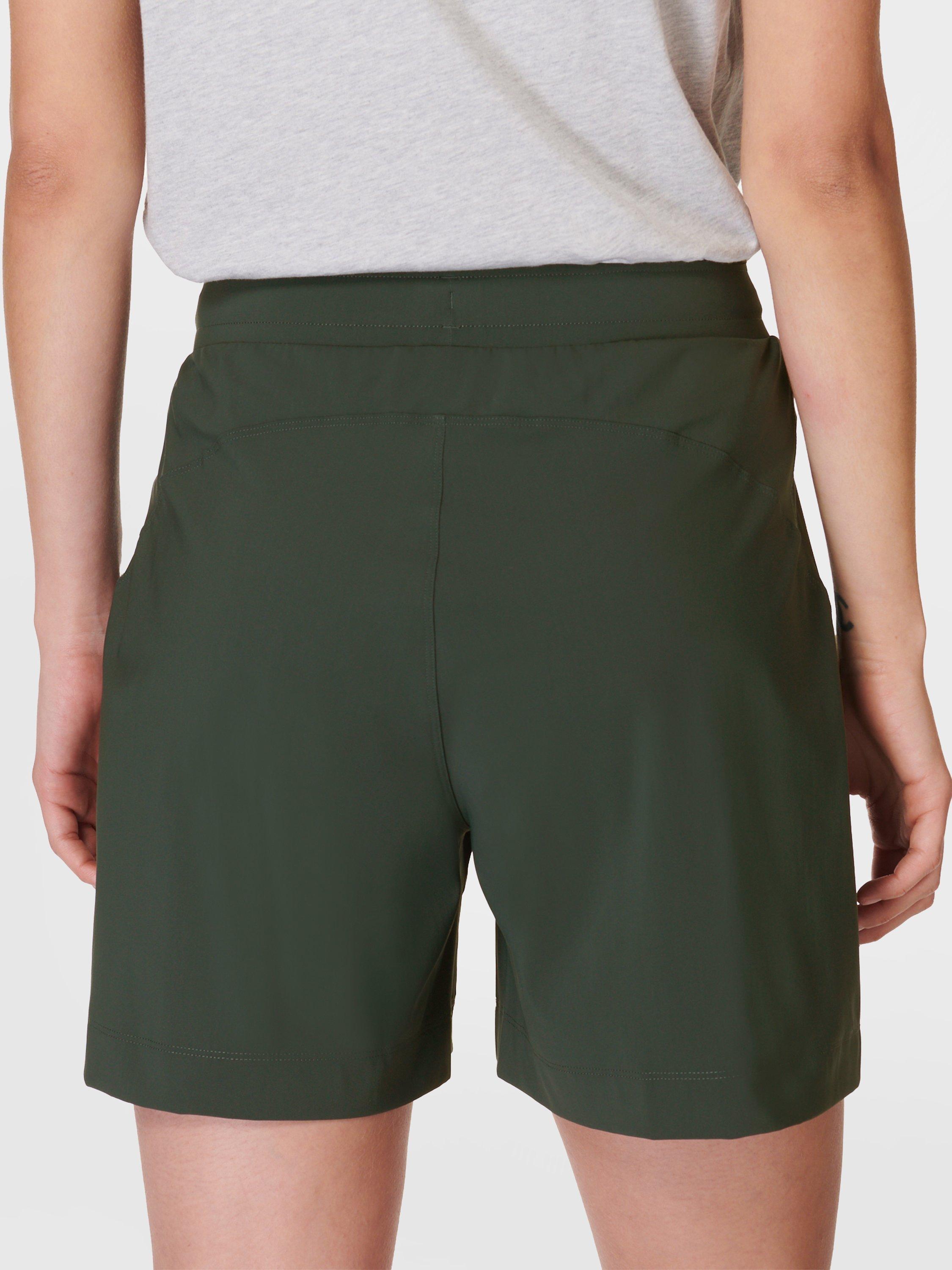 Product image 3 of 8, which shows Sweaty Betty Explorer 5.5" Shorts, Trek Green, XXS
