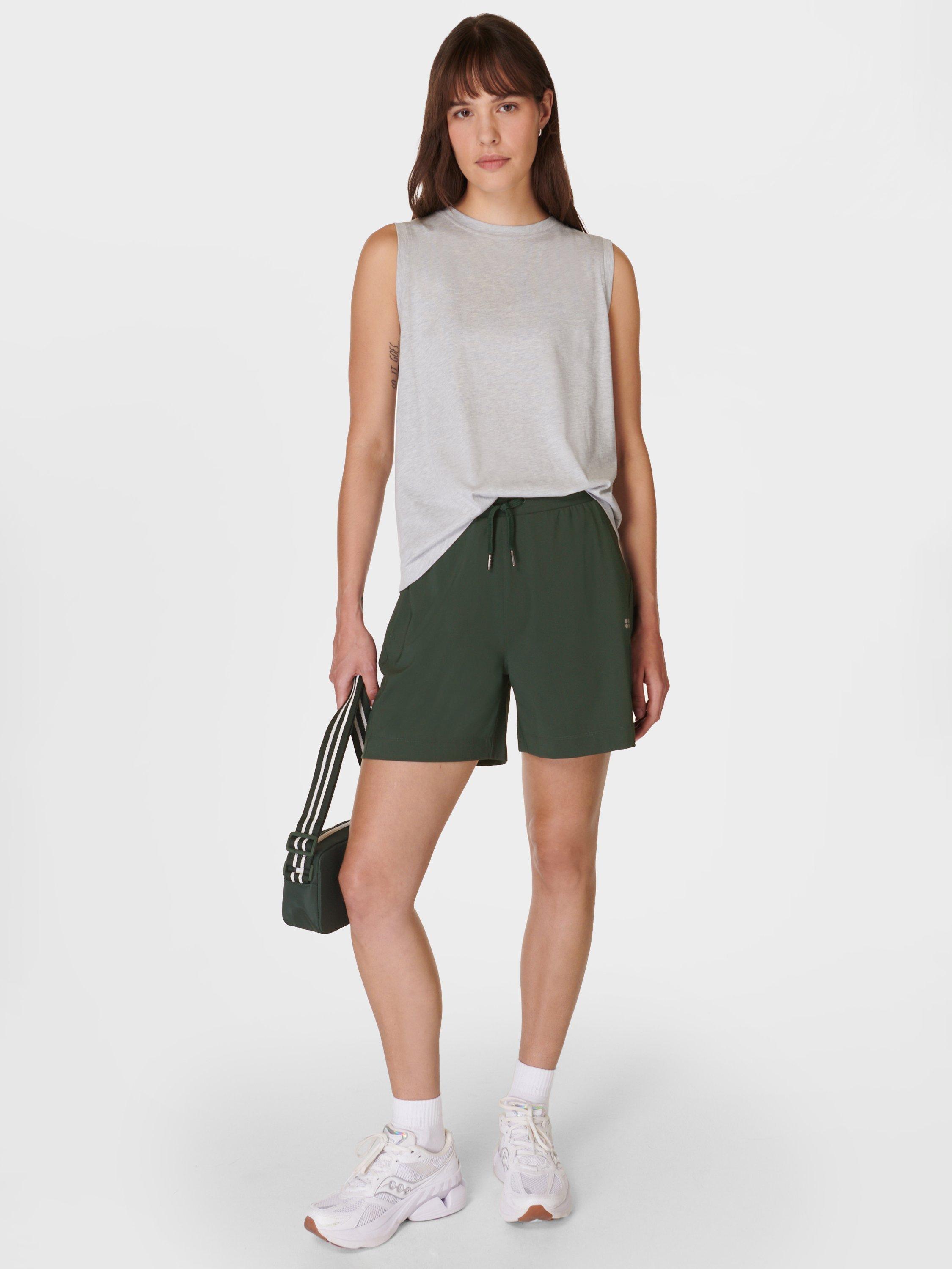 Product image 4 of 8, which shows Sweaty Betty Explorer 5.5" Shorts, Trek Green, XXS