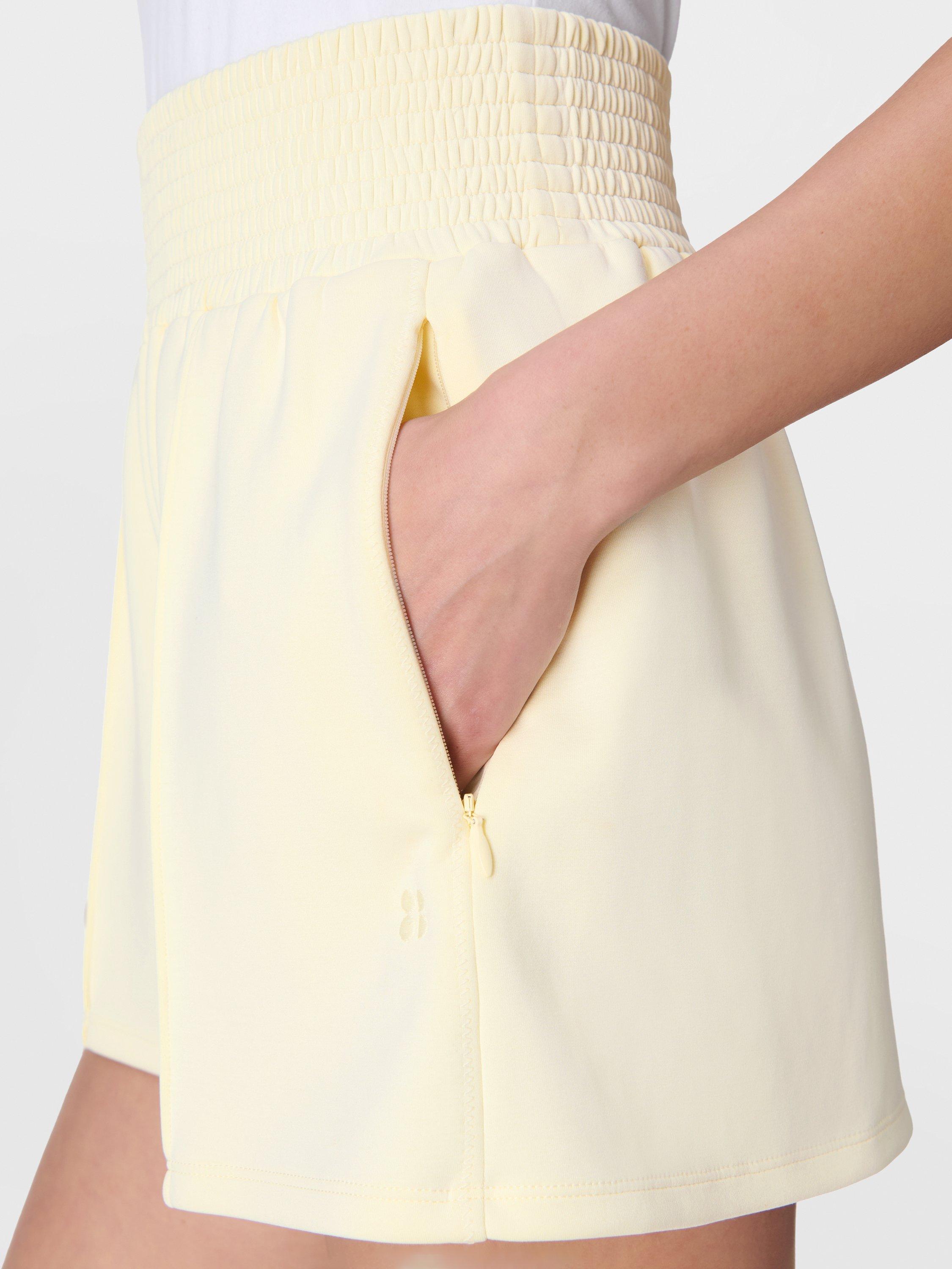 Product image 5 of 8, which shows Sweaty Betty Sand Wash CloudWeight Shorts, Buttercream Yellow, XXS