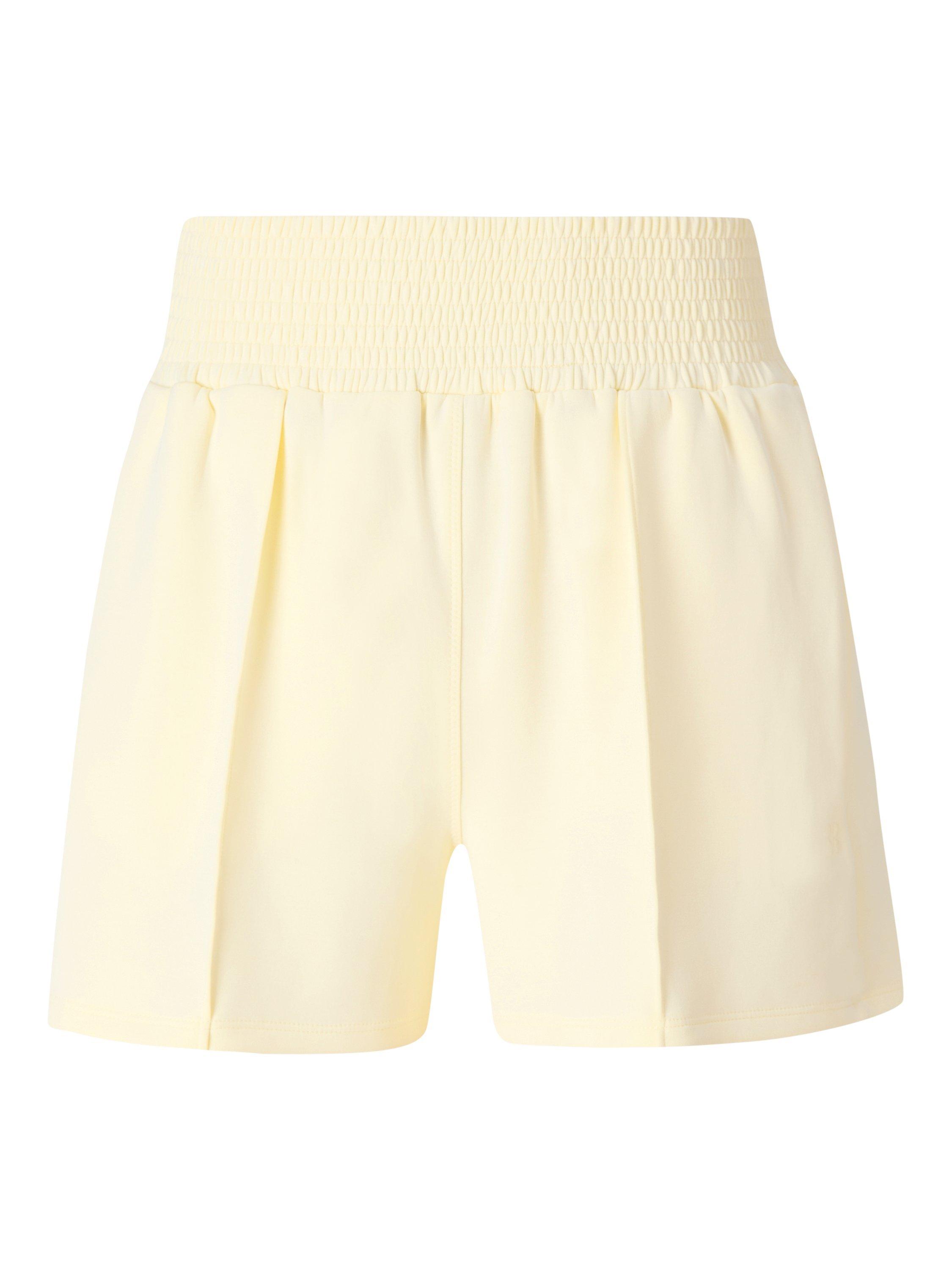 Product image 8 of 8, which shows Sweaty Betty Sand Wash CloudWeight Shorts, Buttercream Yellow, XXS