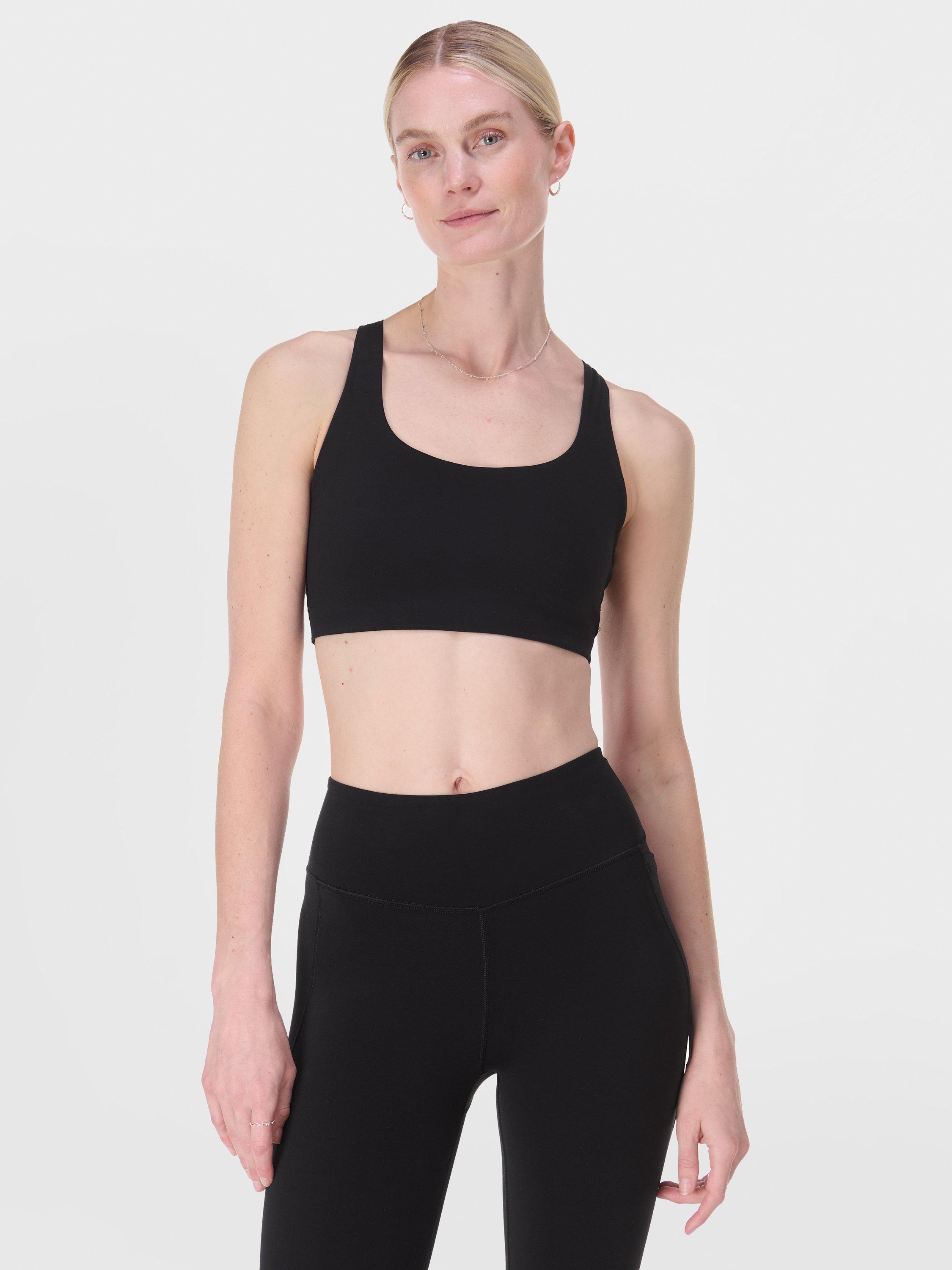 Product image 1 of 7, which shows Sweaty Betty Ultimate Studio Racerback Sports Bra, Black, XXS