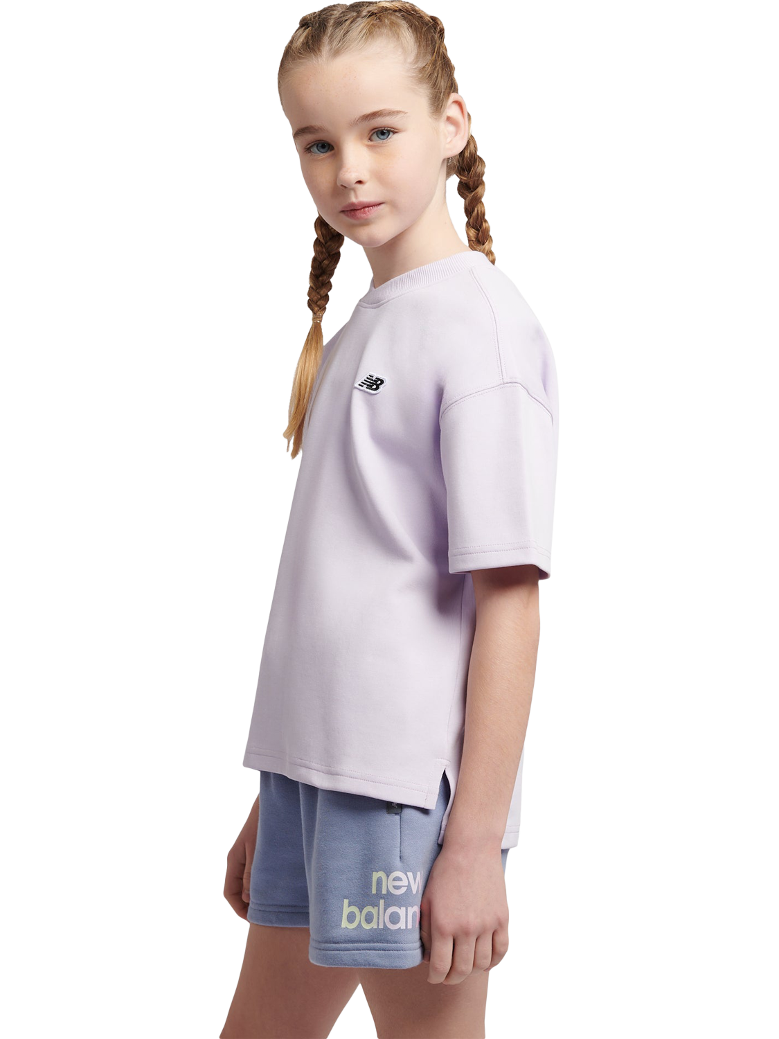 Product image 2 of 10, which shows New Balance Kids' T23 Cross Neck T-Shirt, Bright Lavender, 7-8 years