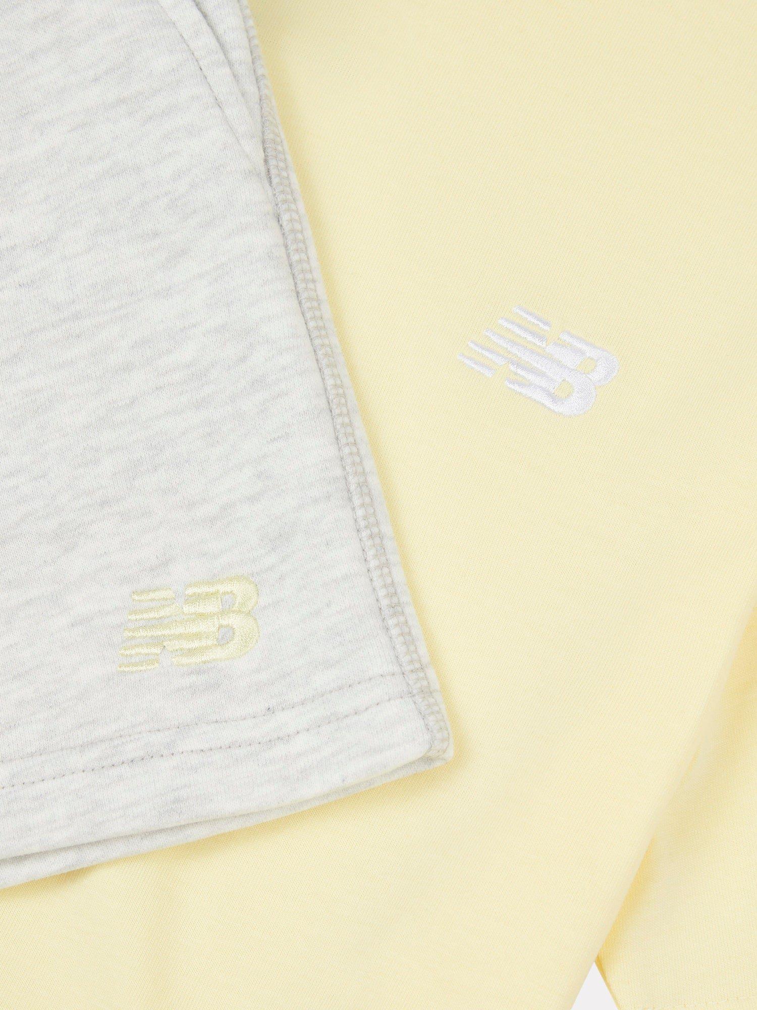 Product image 3 of 5, which shows New Balance Kids' Cotton T-Shirt and Shorts Set, Parchment, 7-8 years