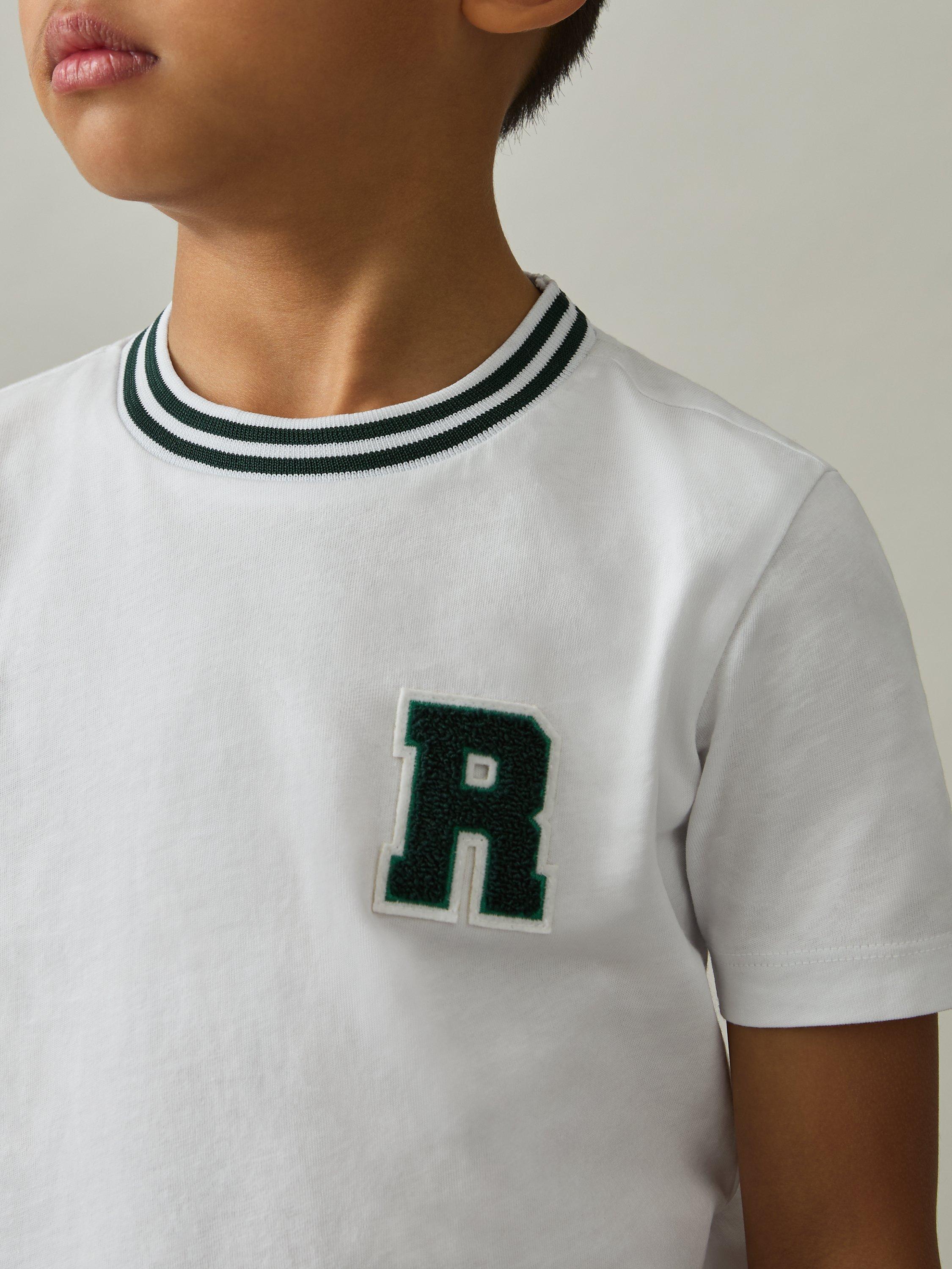 Product image 3 of 4, which shows Reiss Kids' Palmers Logo T-Shirt, White, 3-4 years
