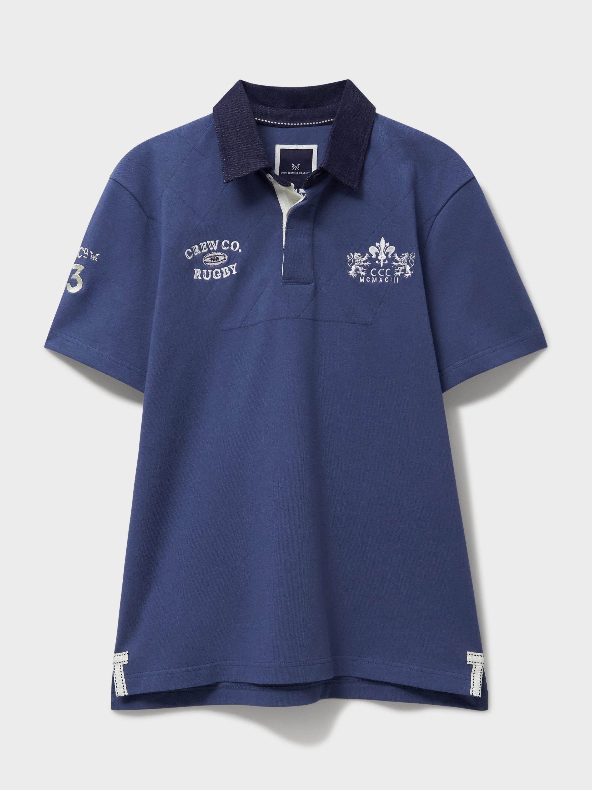 Product image 6 of 6, which shows Crew Clothing Patchwork Short Sleeve Cotton Polo Shirt, Dark Blue, L