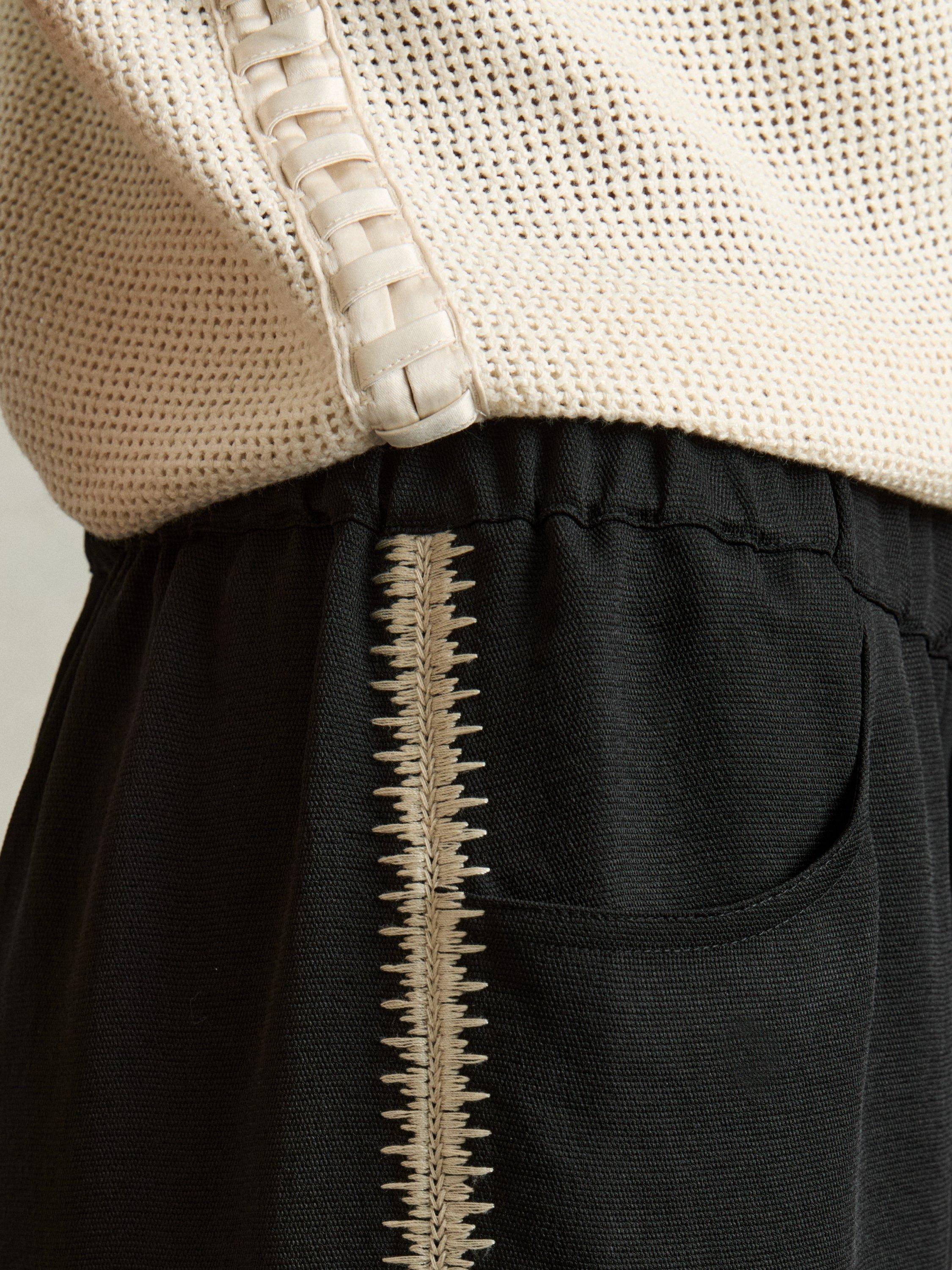 Product image 5 of 5, which shows Reiss Petite Inaya Stripe Wide Leg Trousers, Black, 6Pt