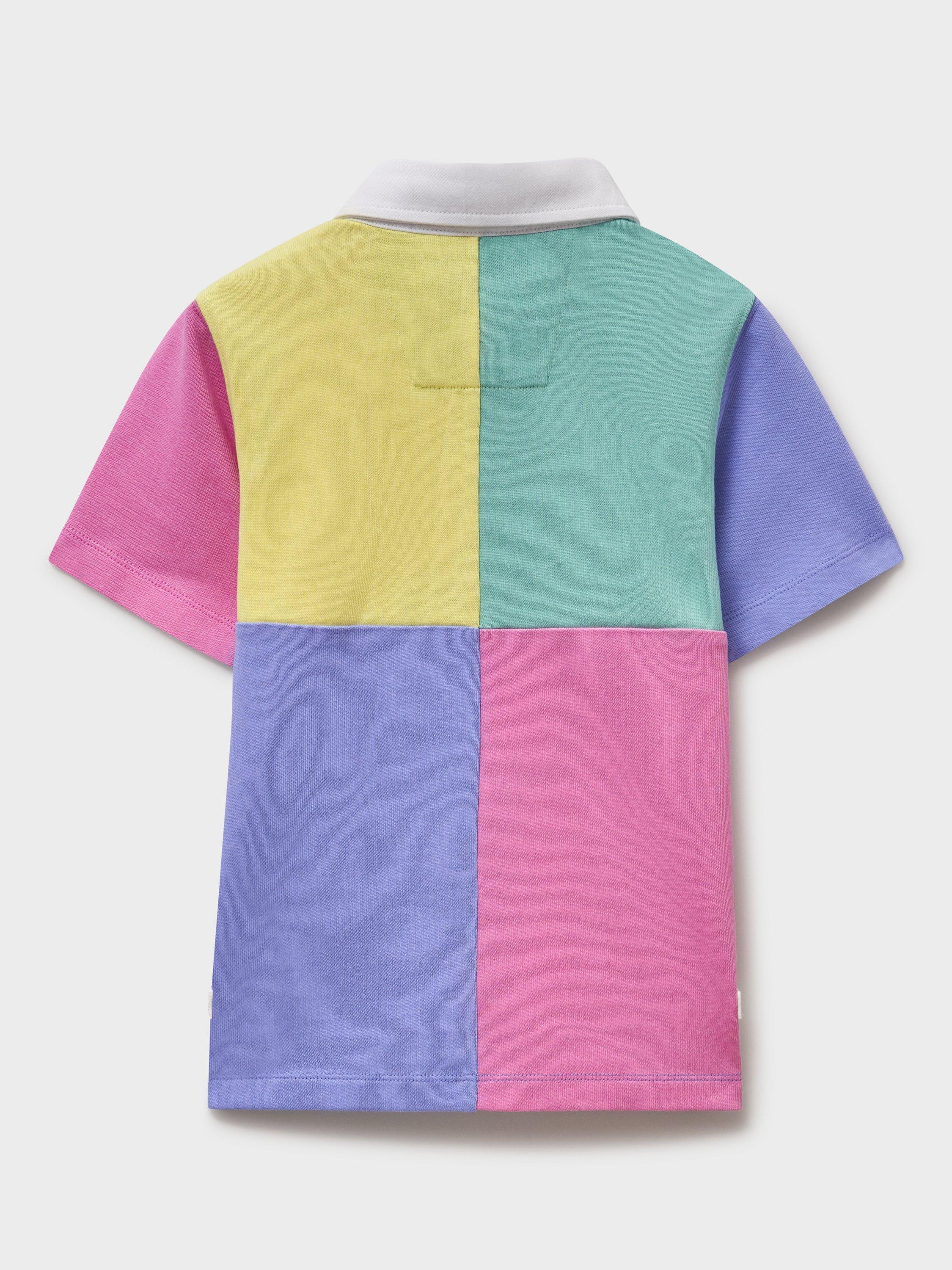Product image 2 of 5, which shows Crew Clothing Kids' Cotton Short Sleeved Harlequin Rugby Shirt, Multi/Pink, 8-9 years