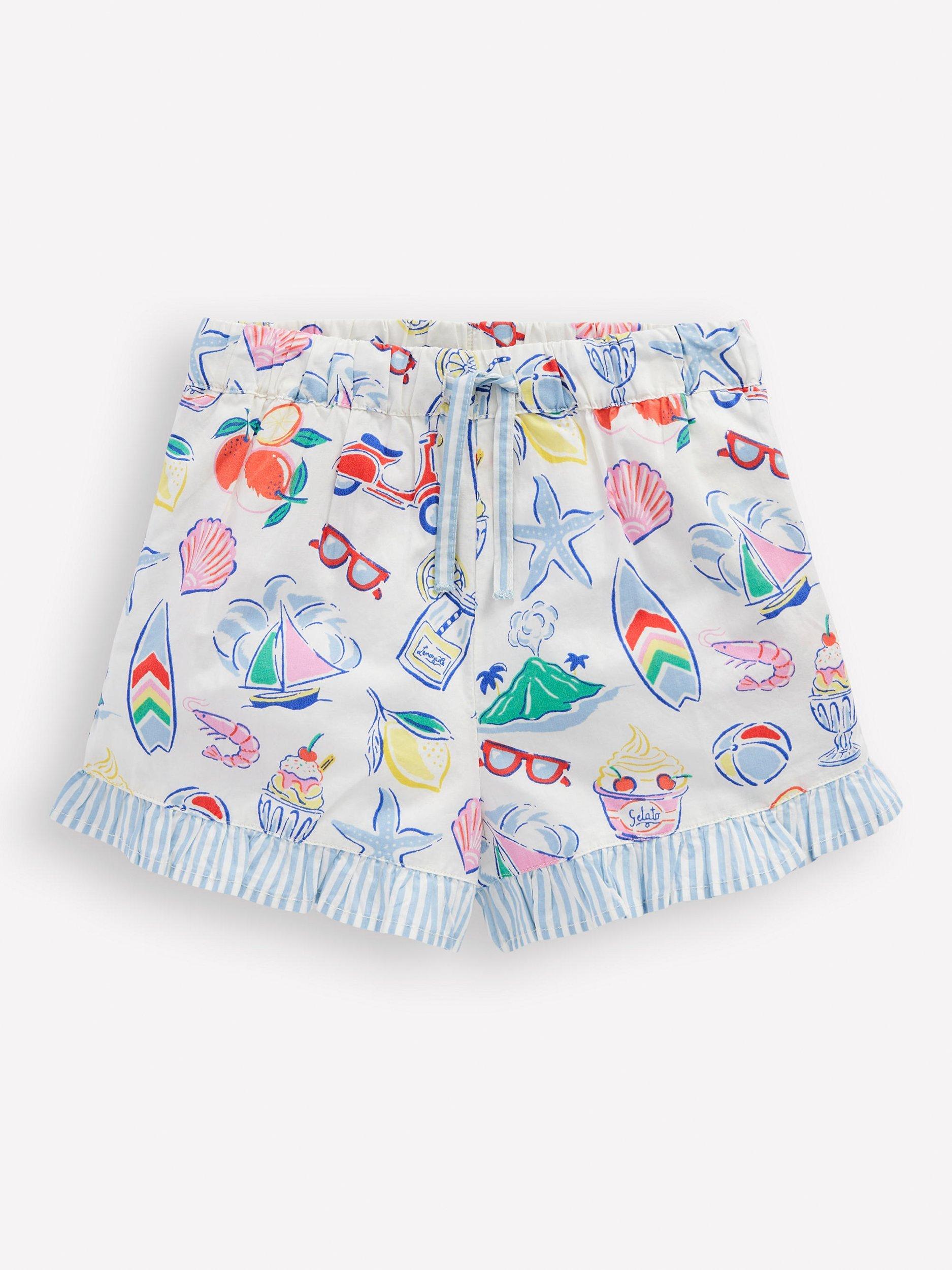Product image 1 of 3, which shows Mini Boden Kids' Juniper Frill Shorts, Ivory Holiday Print, 6-7 years