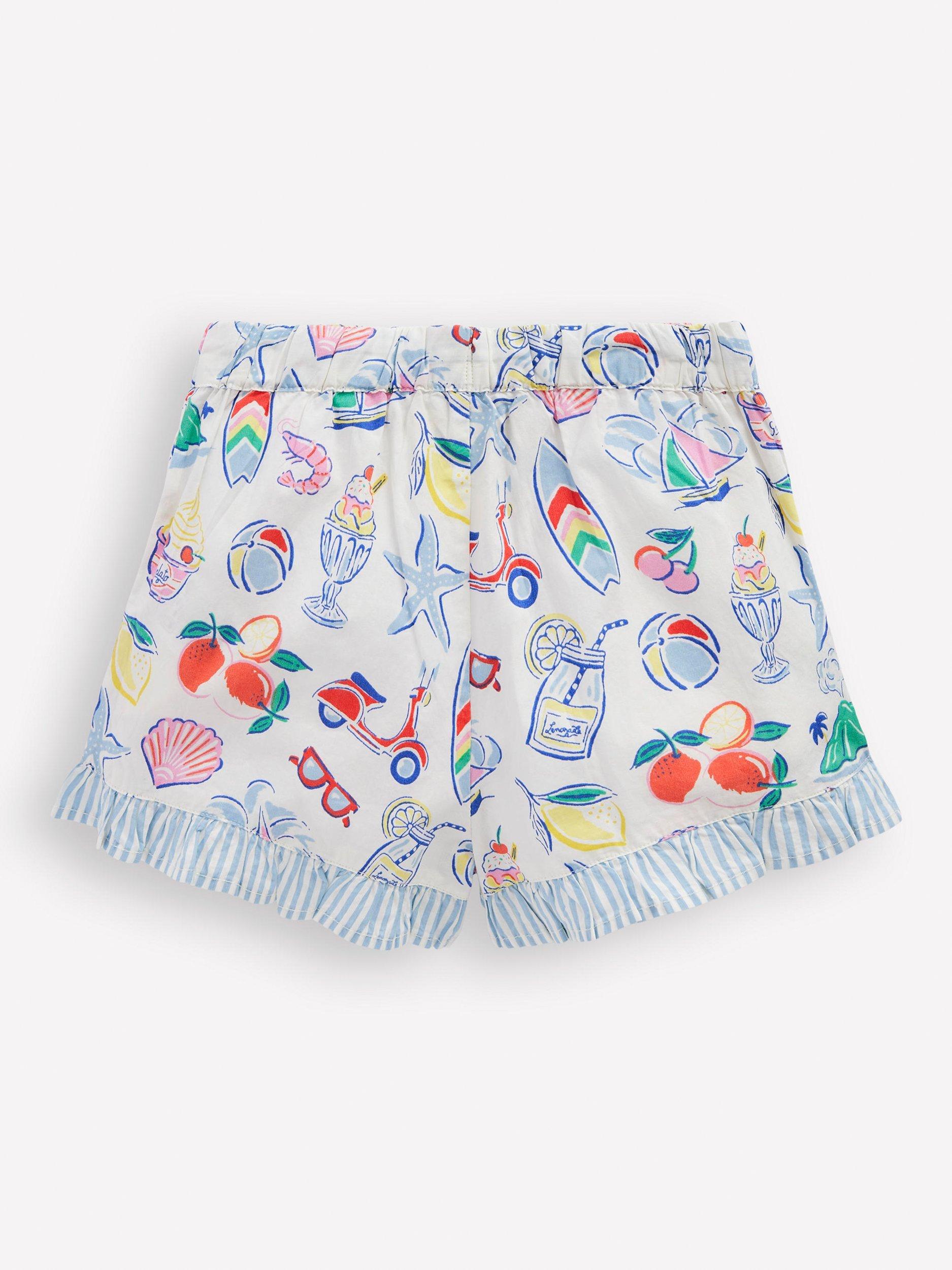 Product image 2 of 3, which shows Mini Boden Kids' Juniper Frill Shorts, Ivory Holiday Print, 6-7 years