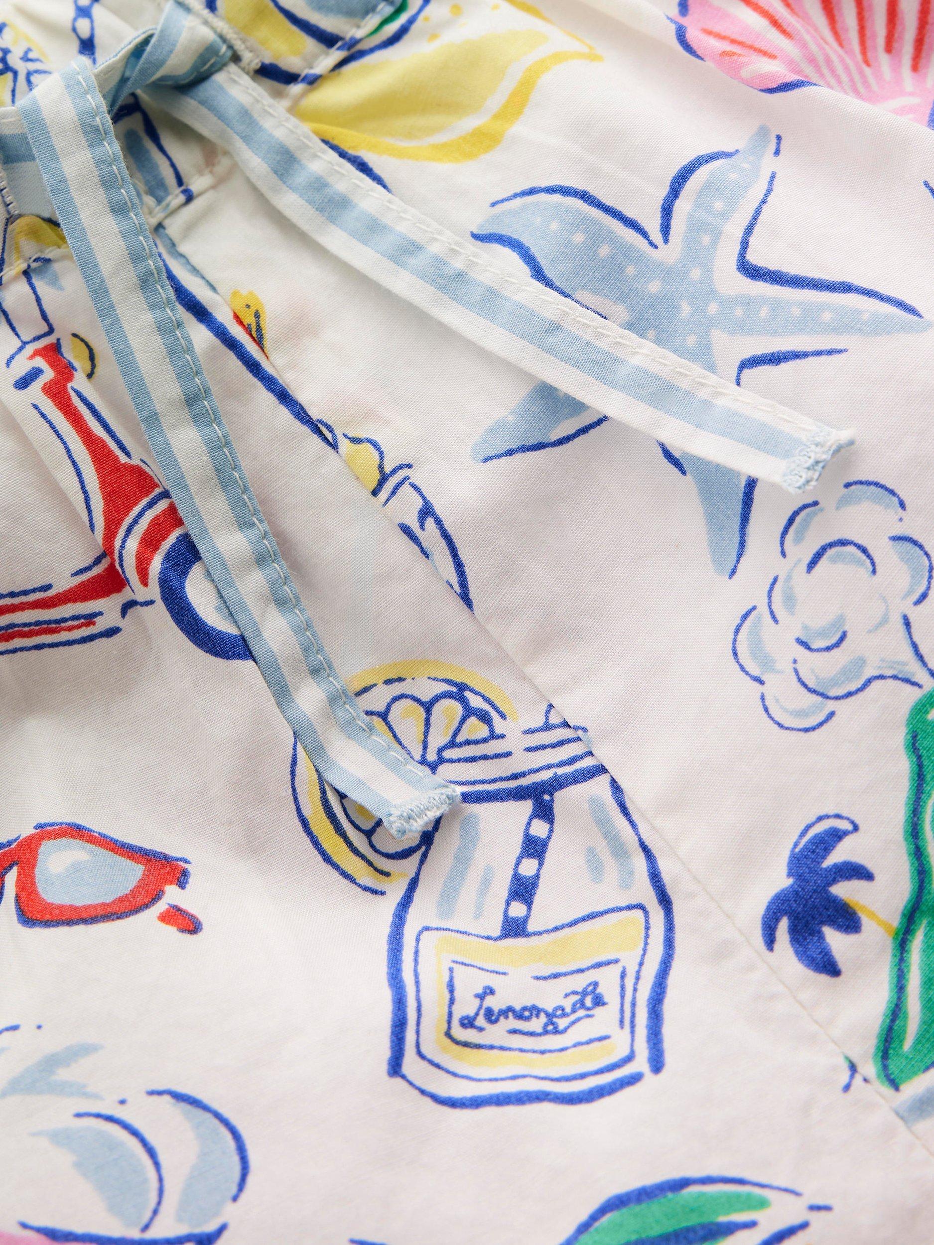 Product image 3 of 3, which shows Mini Boden Kids' Juniper Frill Shorts, Ivory Holiday Print, 6-7 years