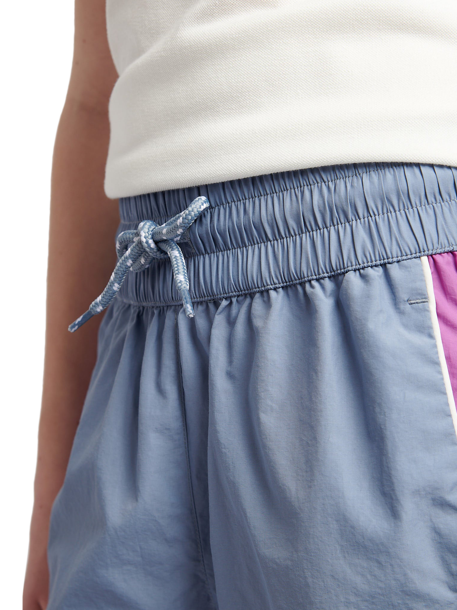 Product image 6 of 9, which shows New Balance Kids' Panelled Woven Track Shorts, Dusk Shower, 7-8 years