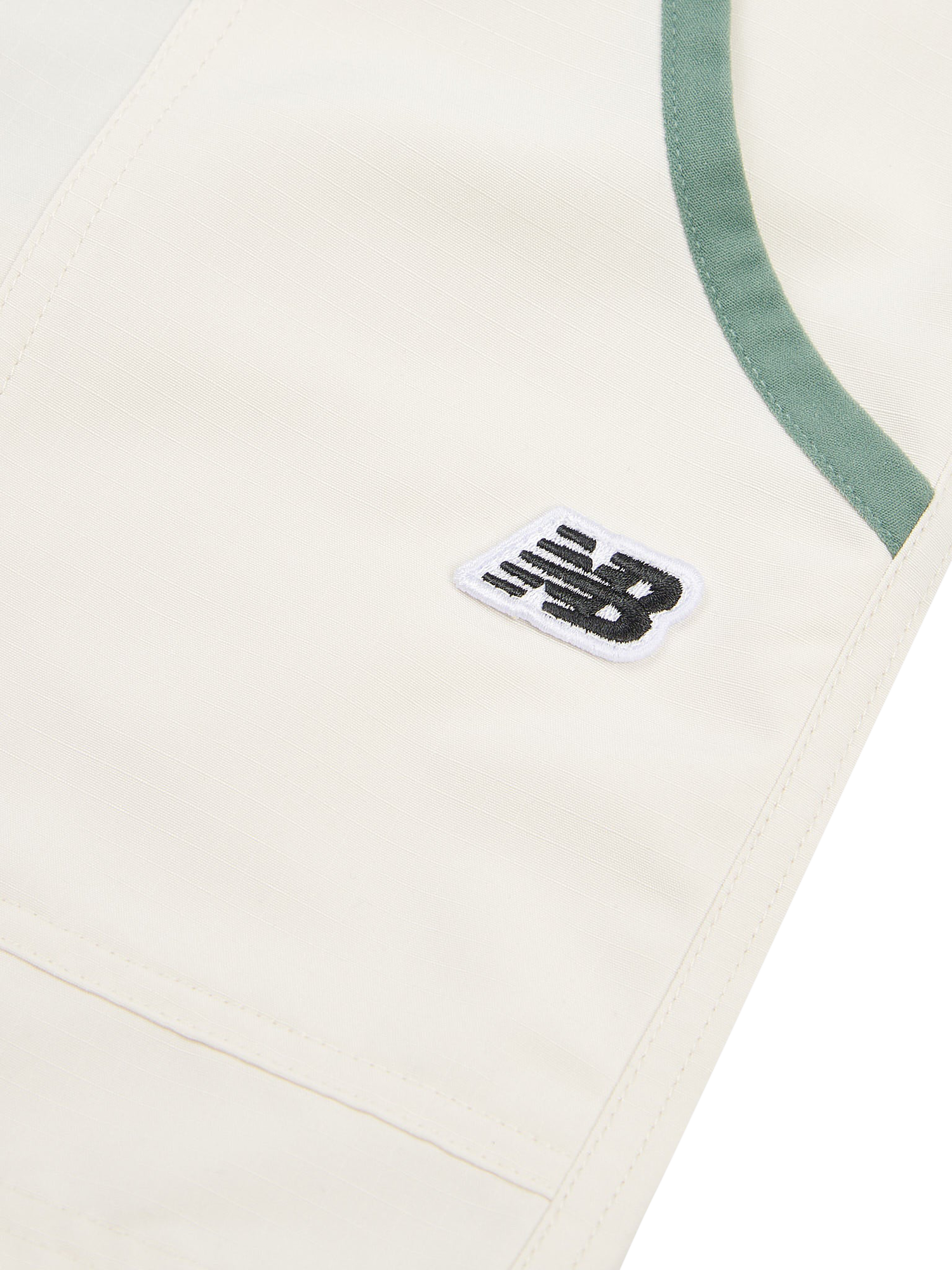 Product image 8 of 8, which shows New Balance Kids' Premium Zip Pocket Shorts, Linen, 7-8 years