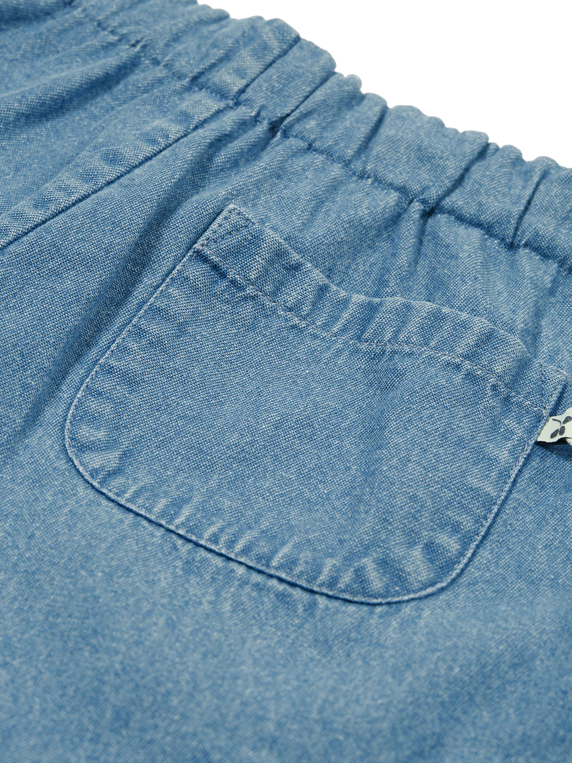 Product image 7 of 9, which shows Frugi Kids' Marigold Organic Cotton Reversible Shorts, Paint A Floral/Denim, 2-3 years