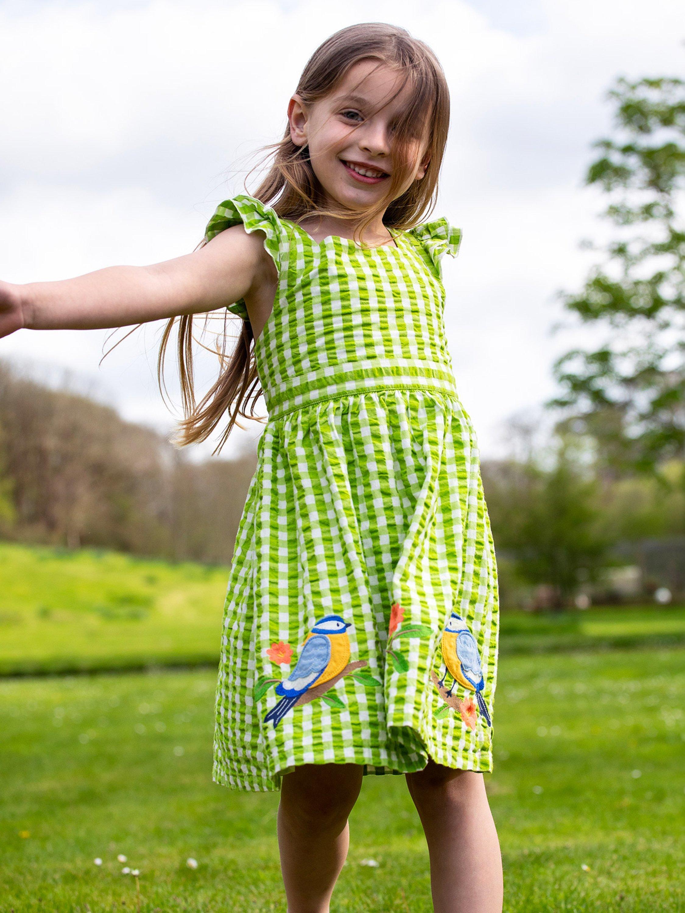 Product image 2 of 8, which shows Frugi Kids' Zaria Organic Cotton Dress Applique Gingham Dress, Macaw/Multi, 2-3 years