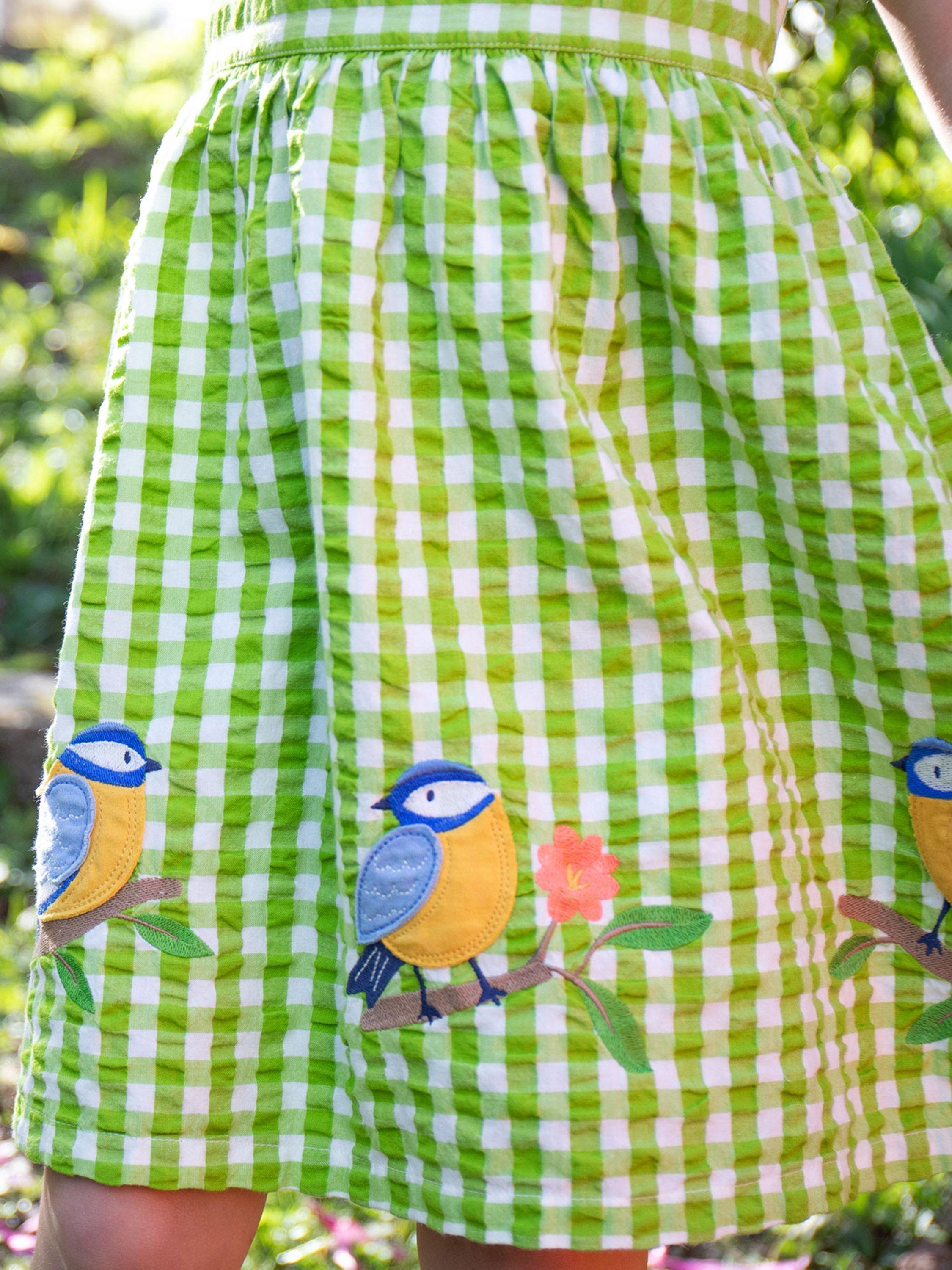 Product image 4 of 8, which shows Frugi Kids' Zaria Organic Cotton Dress Applique Gingham Dress, Macaw/Multi, 2-3 years