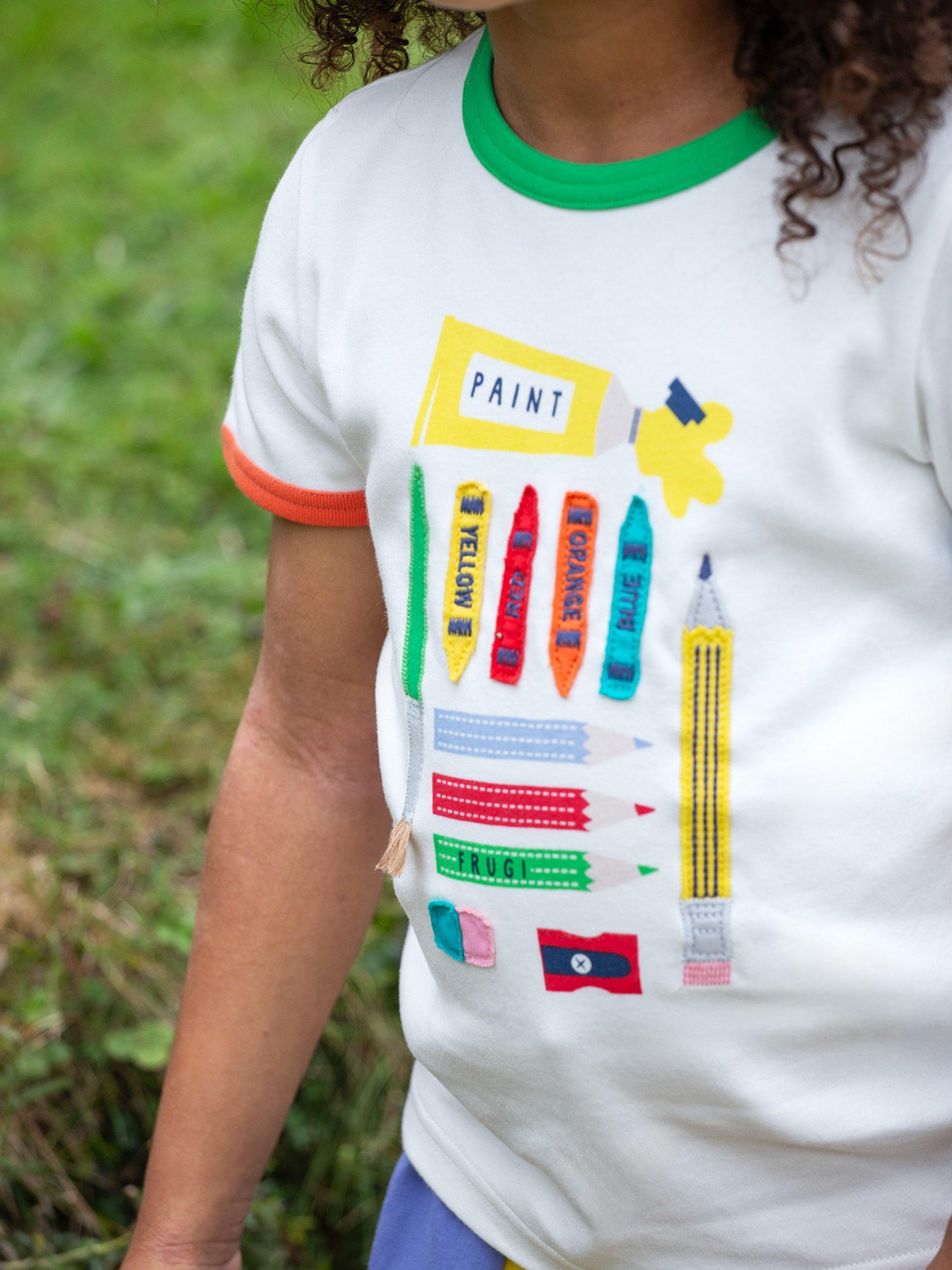 Product image 3 of 7, which shows Frugi Kids' Xavier Organic Cotton Applique T-Shirt , Soft White/Multi, 2-3 years