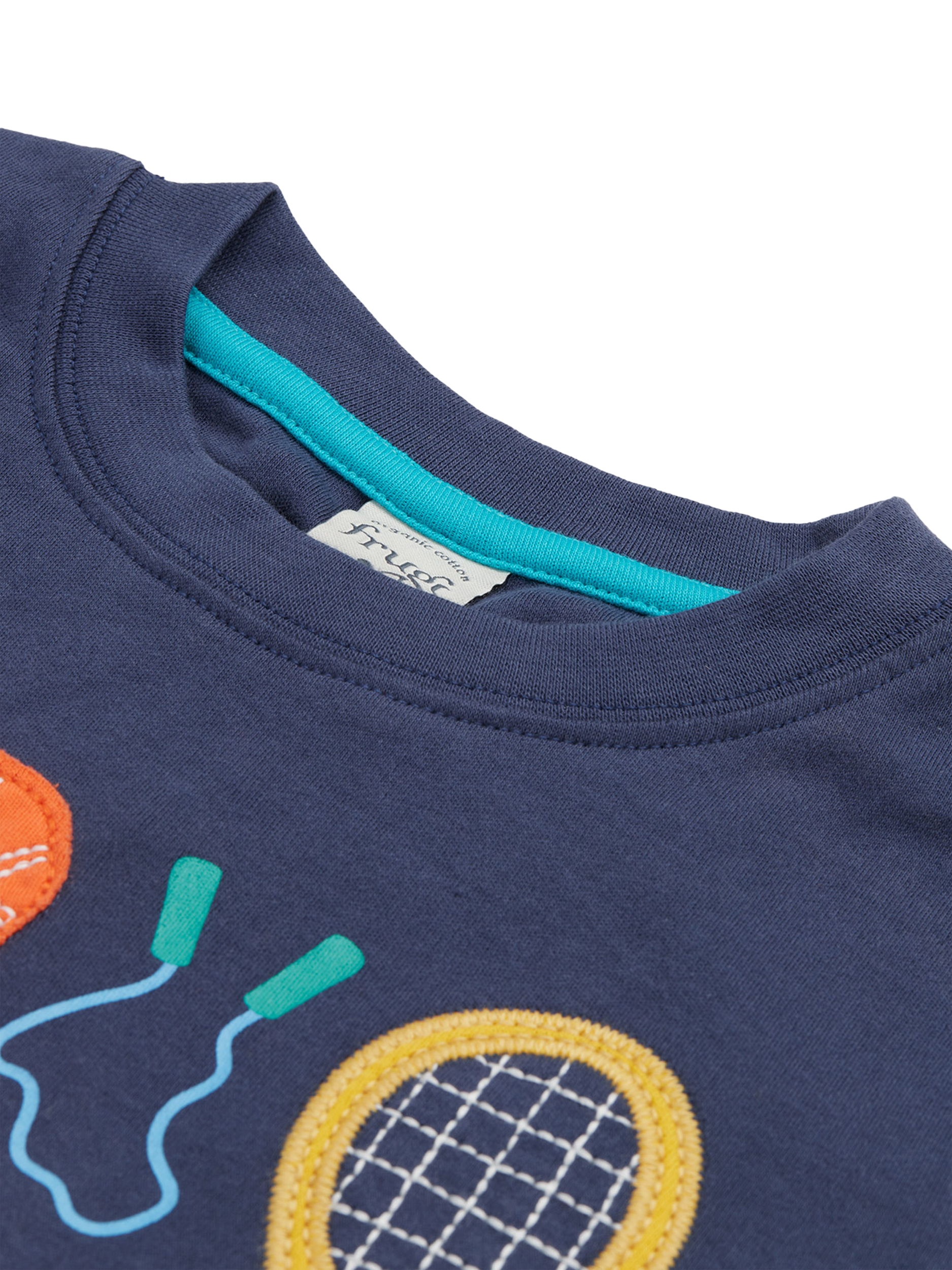 Product image 4 of 4, which shows Frugi Kids' Carsen Organic Cotton Sports Applique T-Shirt, Navy/Multi, 2-3 years