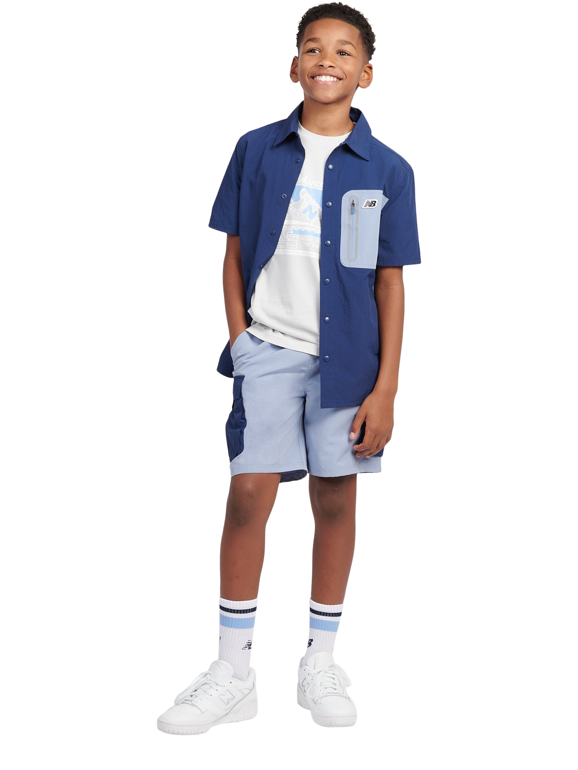 Product image 2 of 10, which shows New Balance Kids' Premium Colour Block Logo Shirt, Navy, 7-8 years