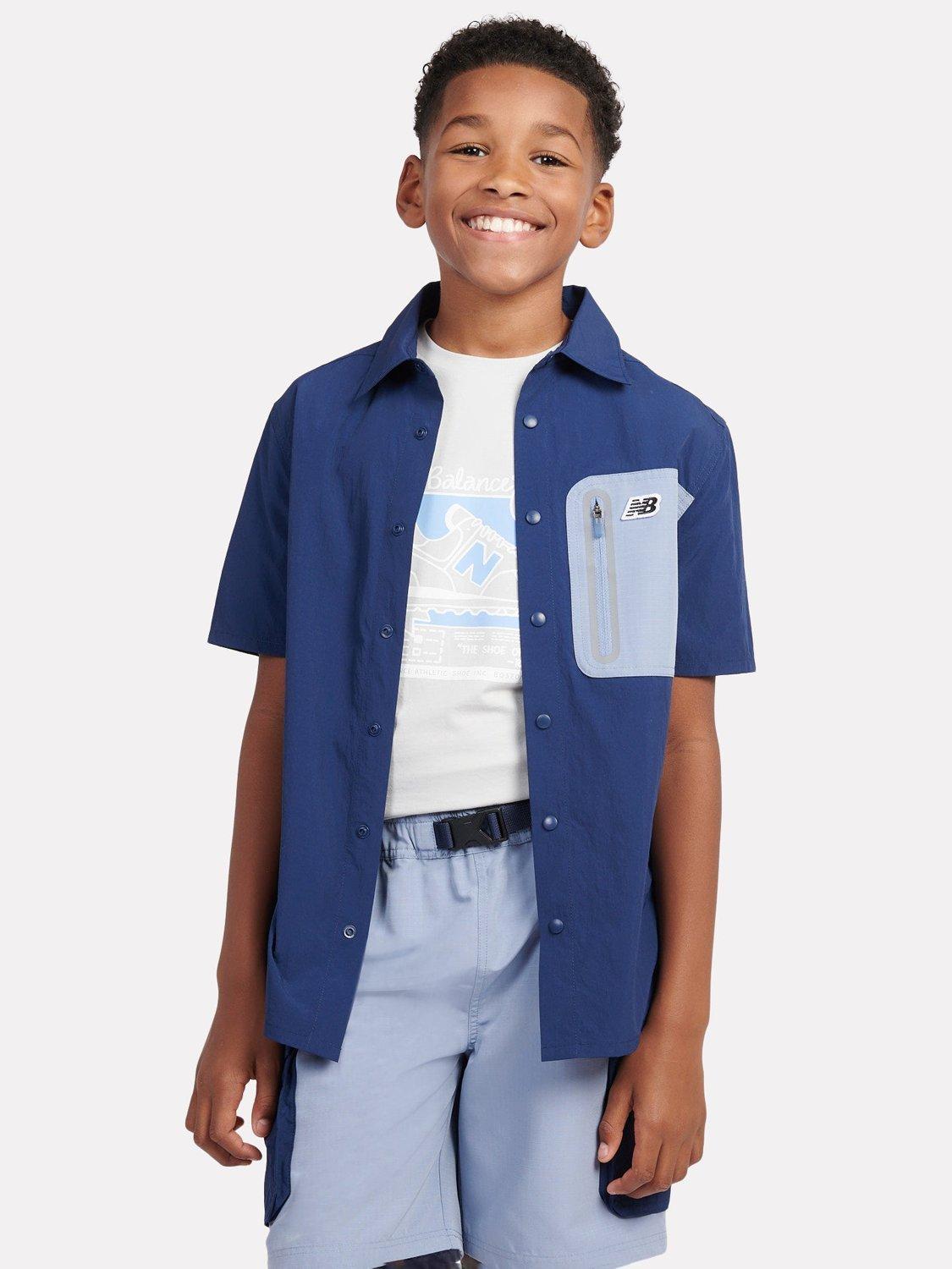 Product image 8 of 10, which shows New Balance Kids' Premium Colour Block Logo Shirt, Navy, 7-8 years