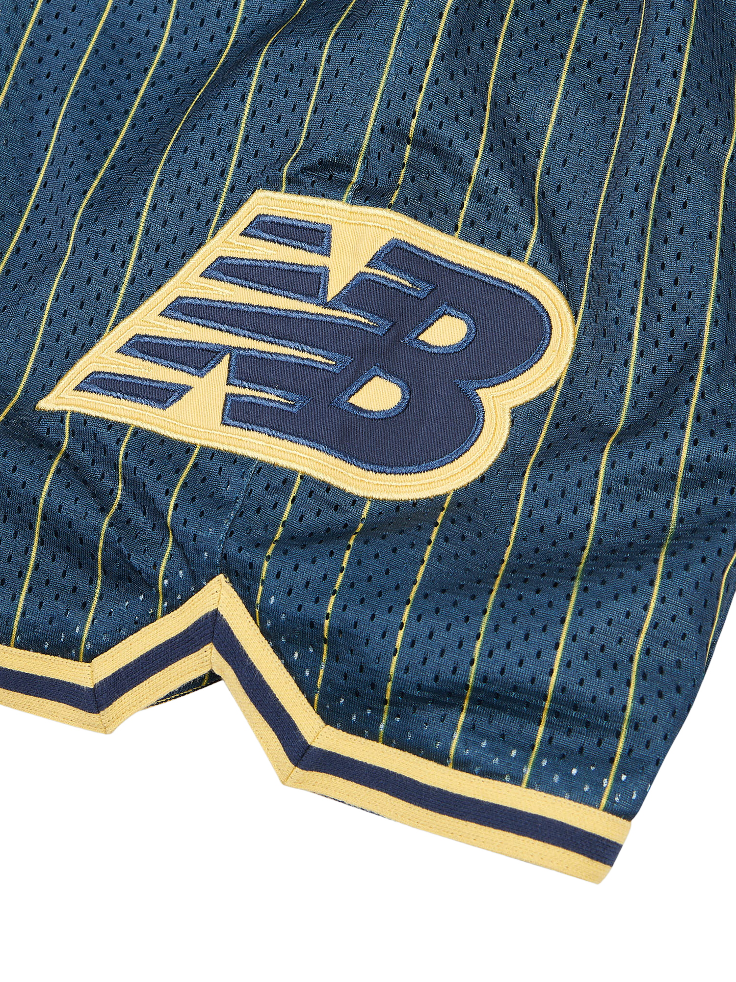 Product image 9 of 10, which shows New Balance Kids' Hoops Shorts, Navy, 7-8 years