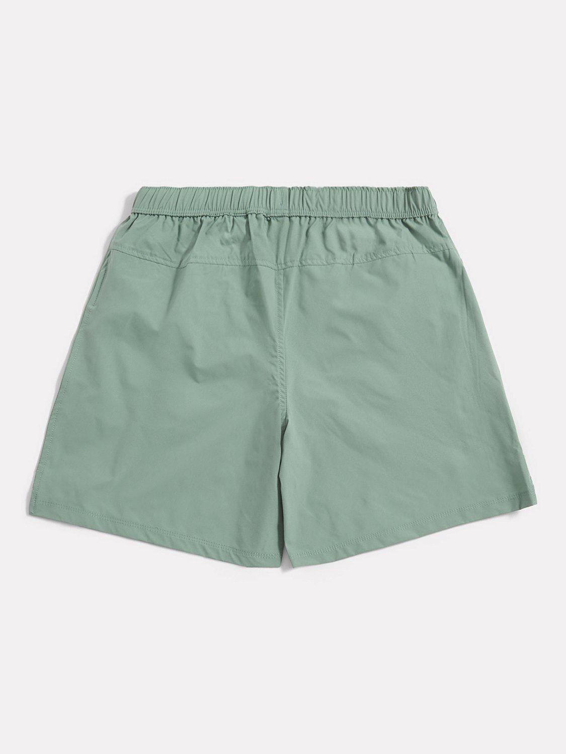 Product image 2 of 4, which shows New Balance Kids' Athletics Shorts, Dark Juniper, 7-8 years