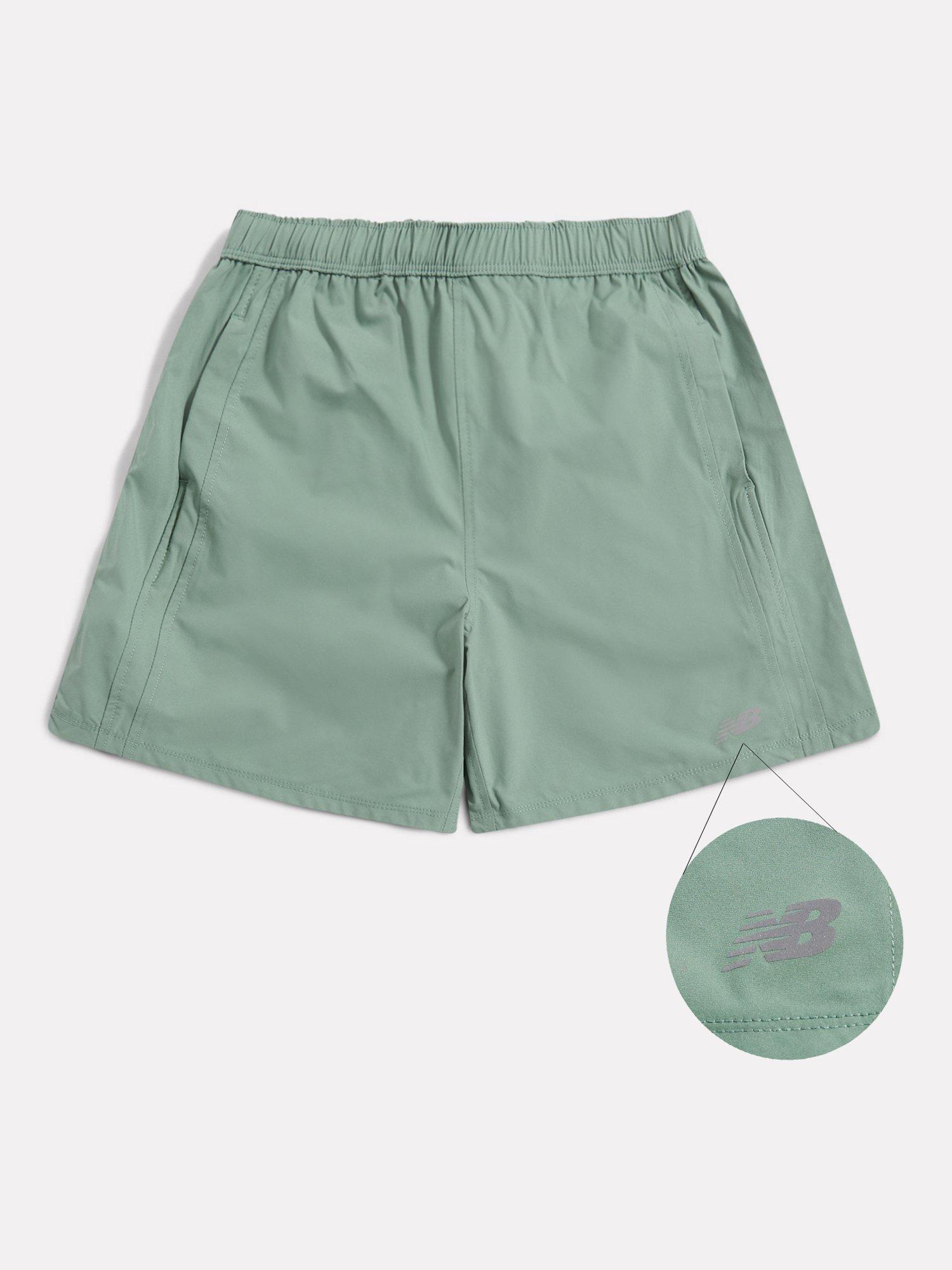 Product image 4 of 4, which shows New Balance Kids' Athletics Shorts, Dark Juniper, 7-8 years