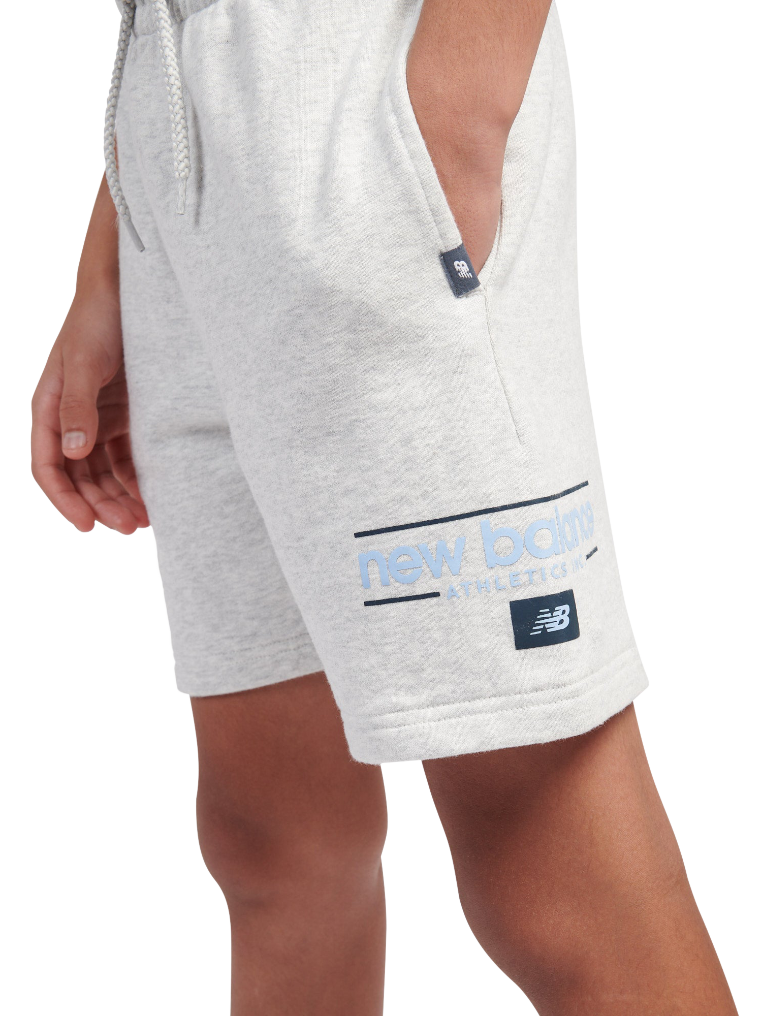 Product image 4 of 9, which shows New Balance Kids' Cotton Shoe Graphic Shorts, Ash Heather, 7-8 years
