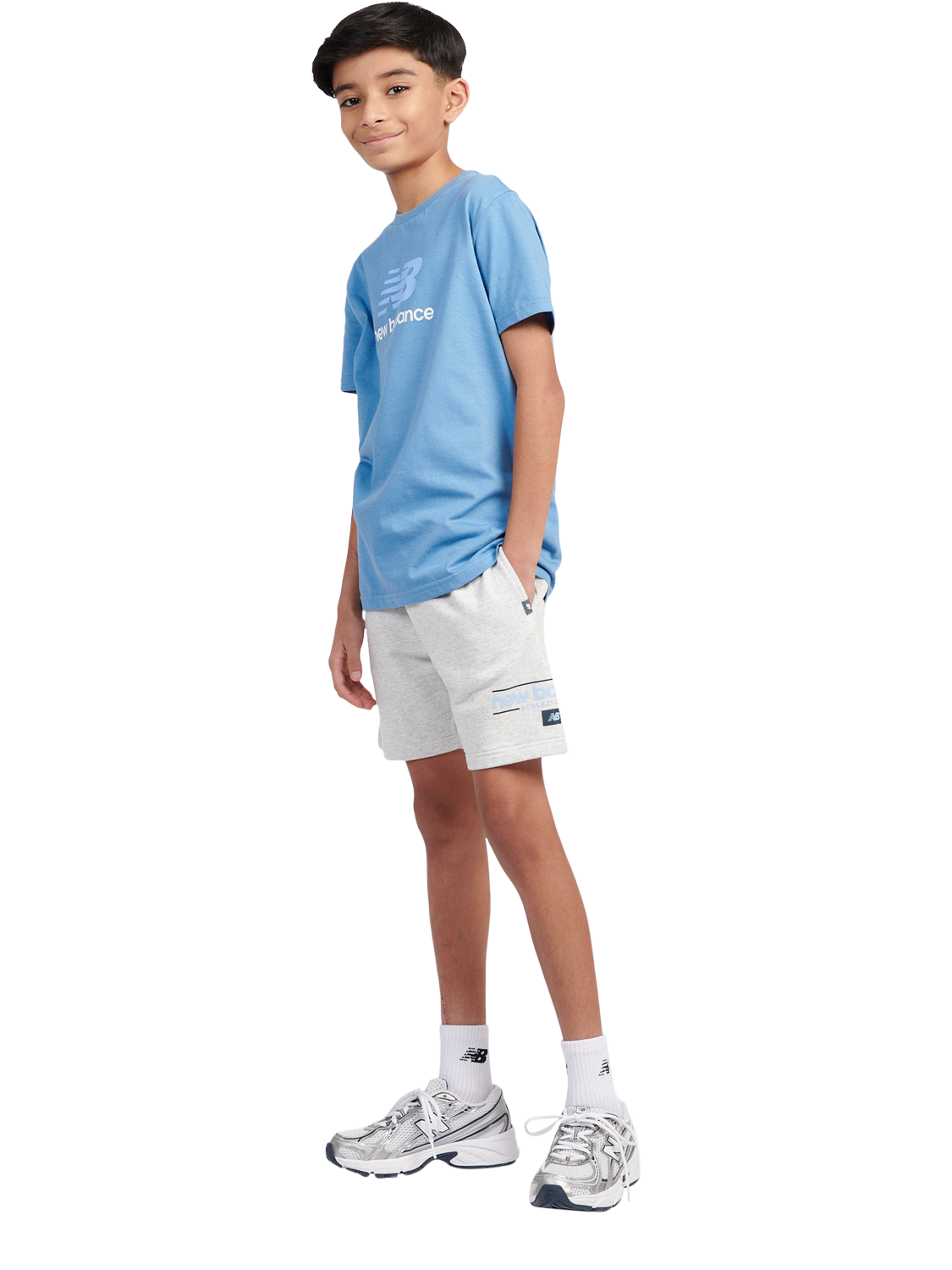 Product image 5 of 9, which shows New Balance Kids' Cotton Shoe Graphic Shorts, Ash Heather, 7-8 years