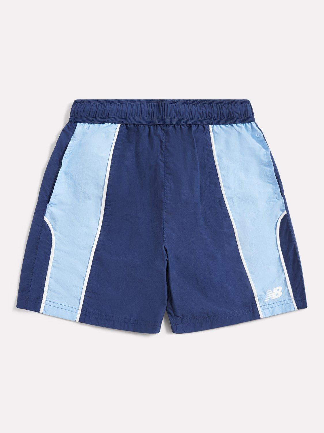Product image 1 of 3, which shows New Balance Kids' Varsity Woven Shorts, Navy, 7-8 years
