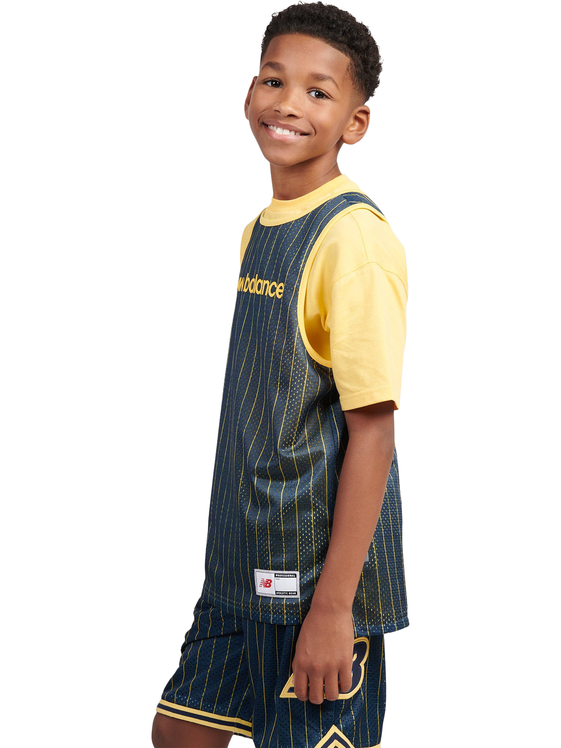 Product image 5 of 11, which shows New Balance Kids' Hoops Reversible Sleeveless Tank, Clementine, 7-8 years