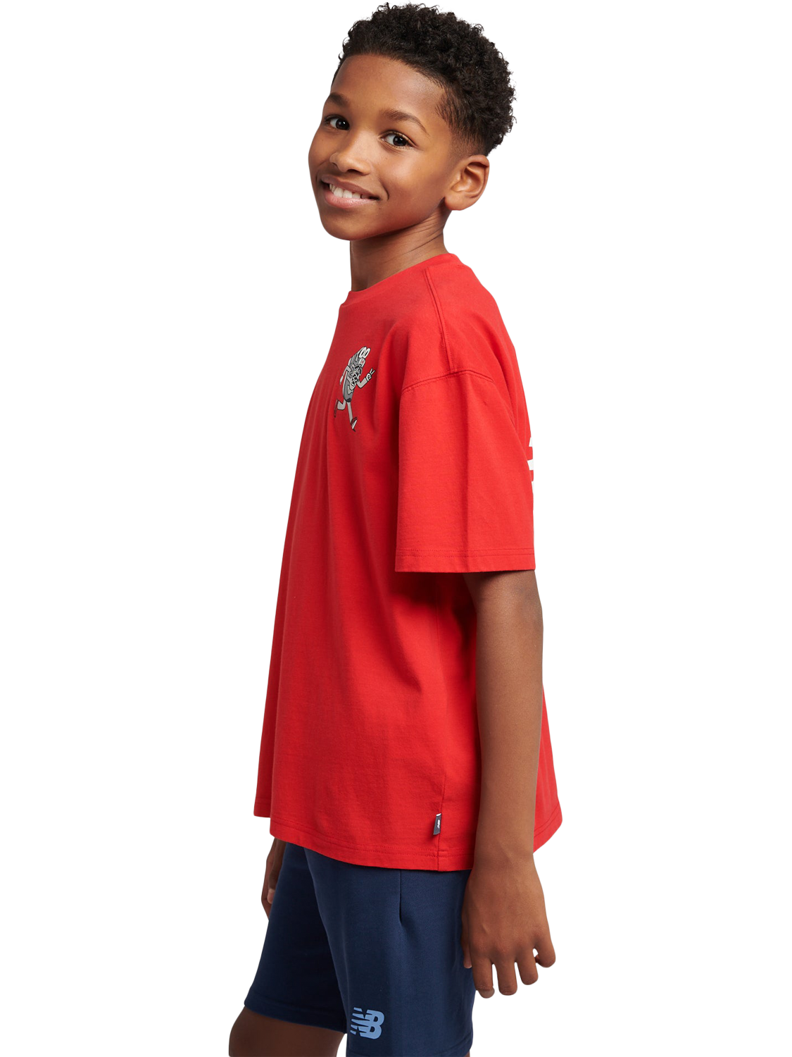 Product image 2 of 11, which shows New Balance Kids' Cotton Sneaker Guy Graphic T-Shirt , True Red, 7-8 years