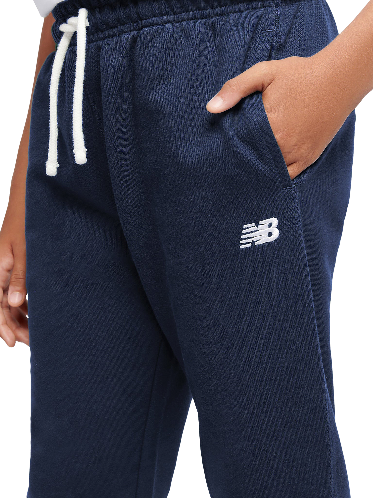 Product image 4 of 8, which shows New Balance Kids' Cotton Logo Joggers, Navy, 7-8 years
