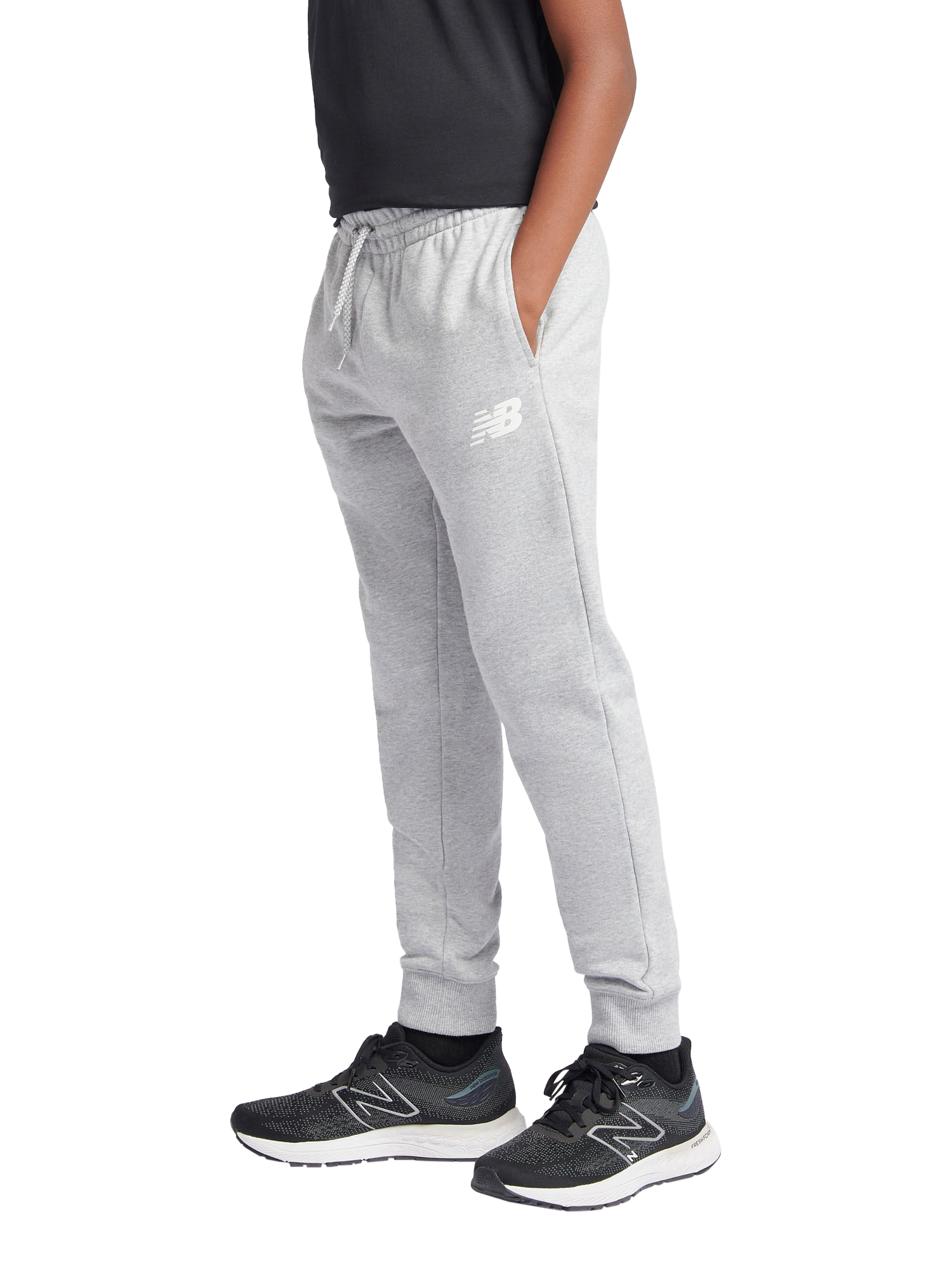 Product image 1 of 5, which shows New Balance Kids' French Terry Stacked Logo Joggers, Grey Heather, 7-8 years