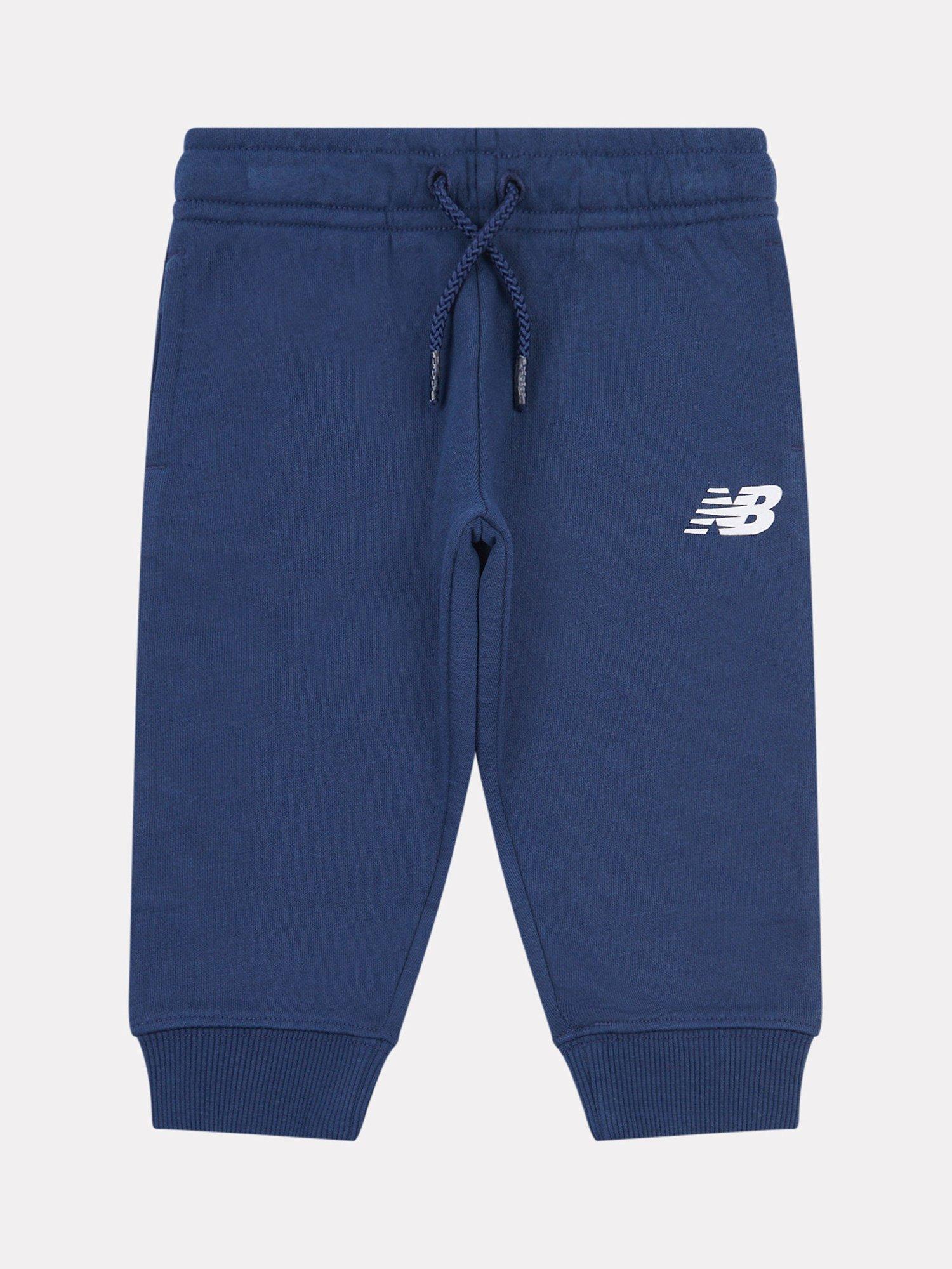 Product image 1 of 3, which shows New Balance Kids' Cotton Relaxed Drawstring Joggers, Navy, 12 months