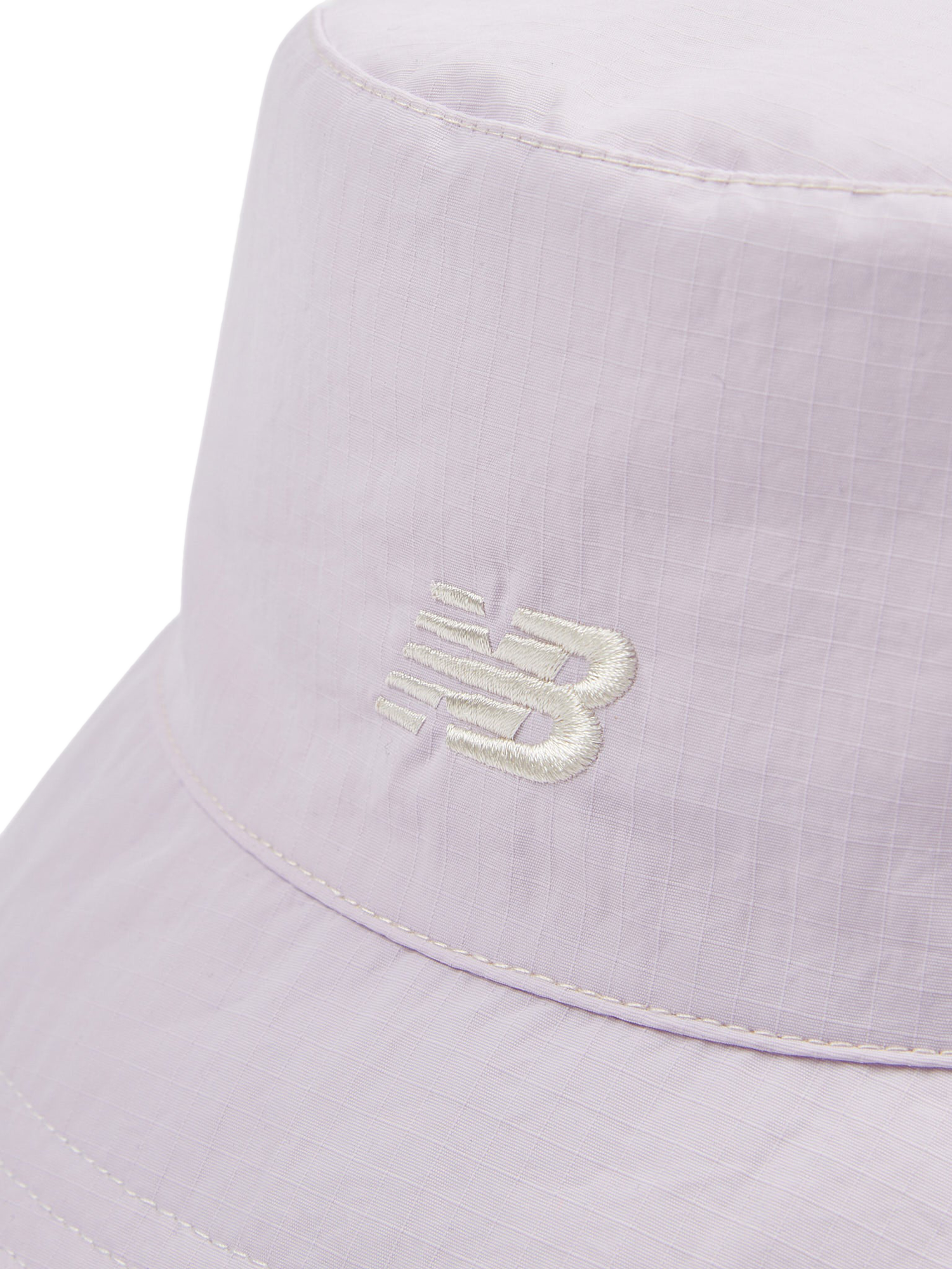 Product image 7 of 10, which shows New Balance Kids' Reversible Bucket Hat, Bright Lavender